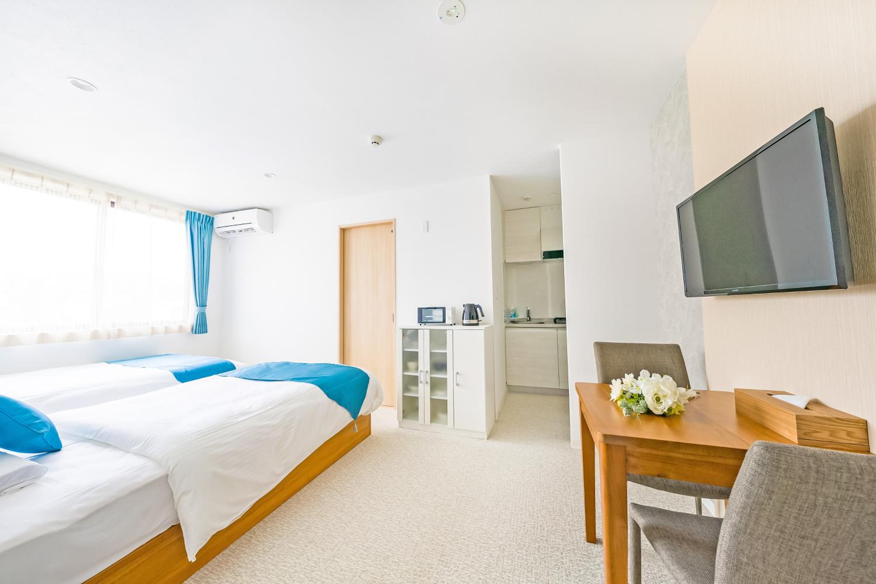 Standard Twin Room - Photo 8