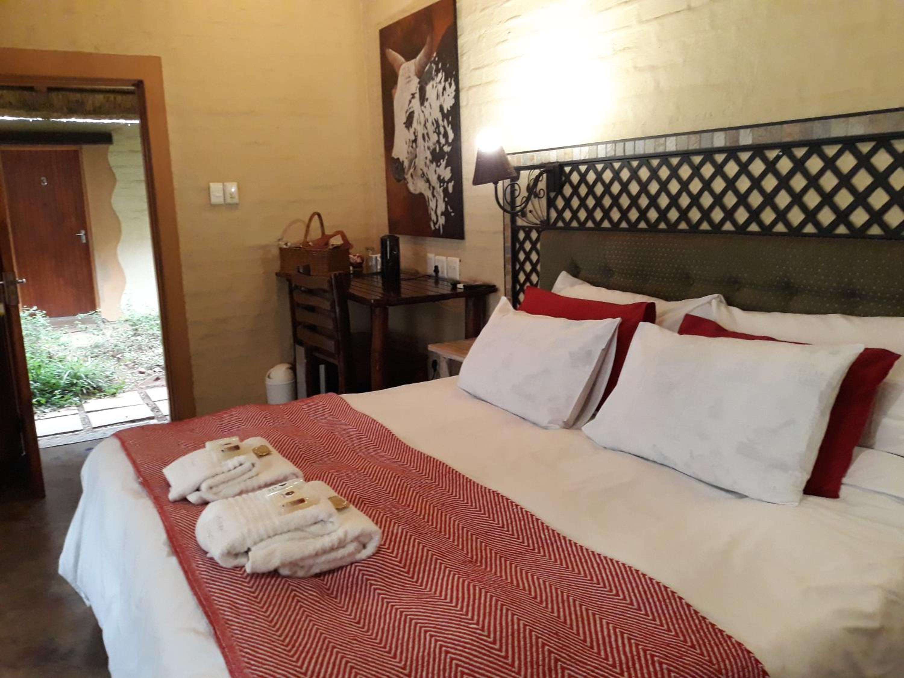Deluxe King Room - Photo 18