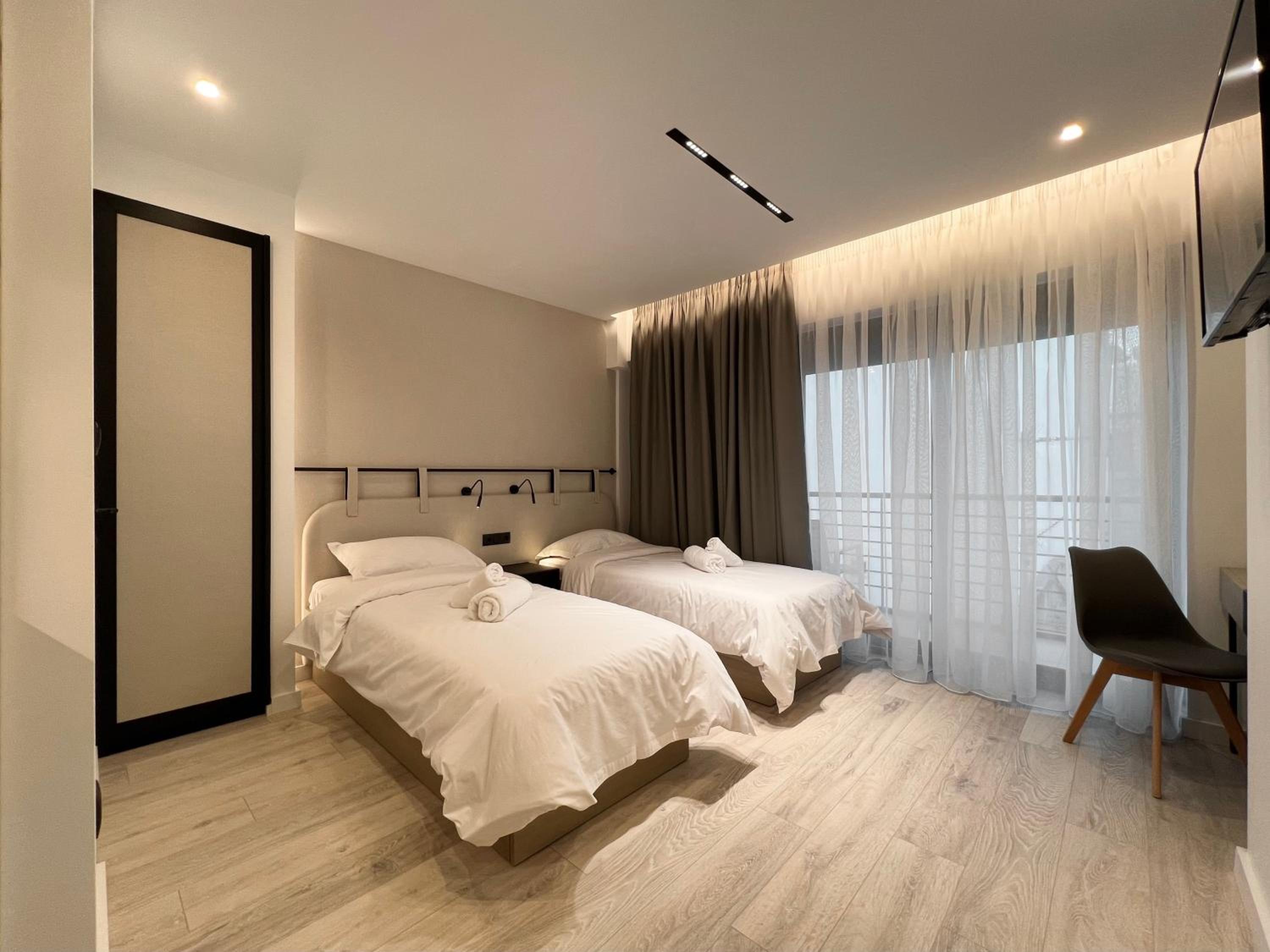 Twin Room - Photo 1