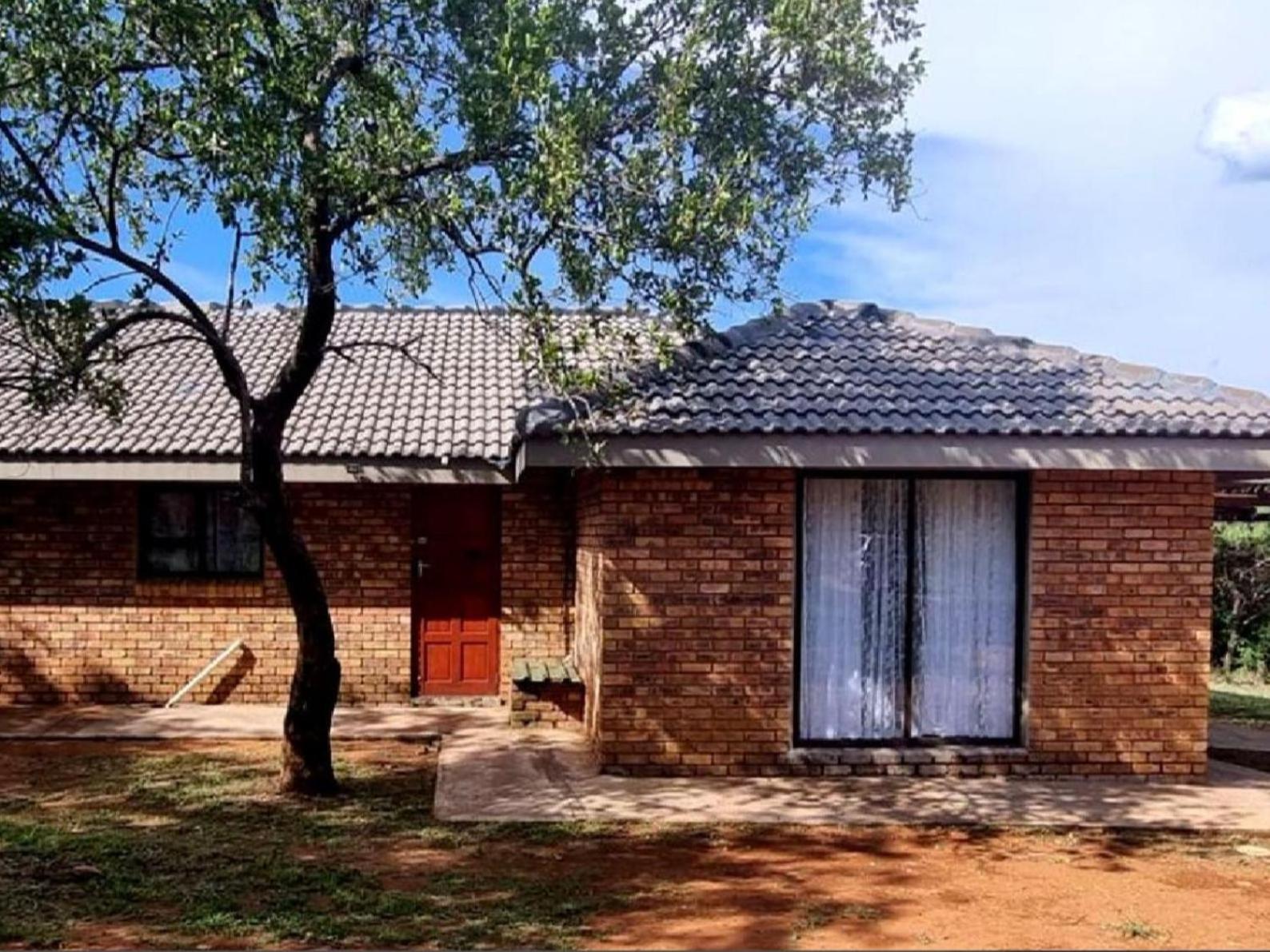 Three-Bedroom House - Photo 14