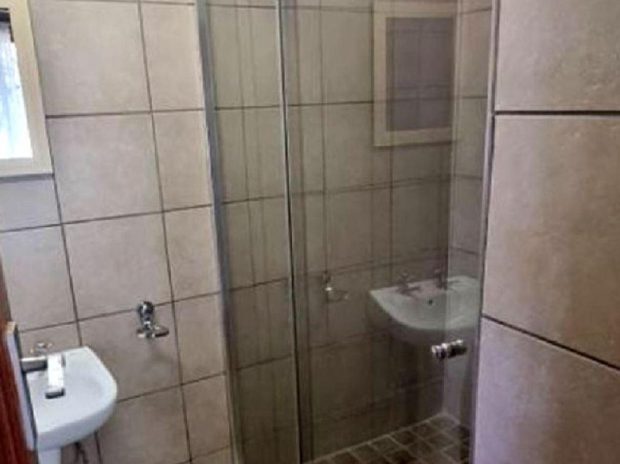 Three-Bedroom House - Photo 7