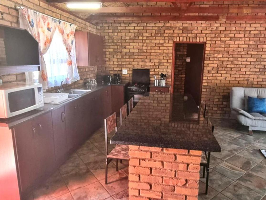 Three-Bedroom House - Photo 2