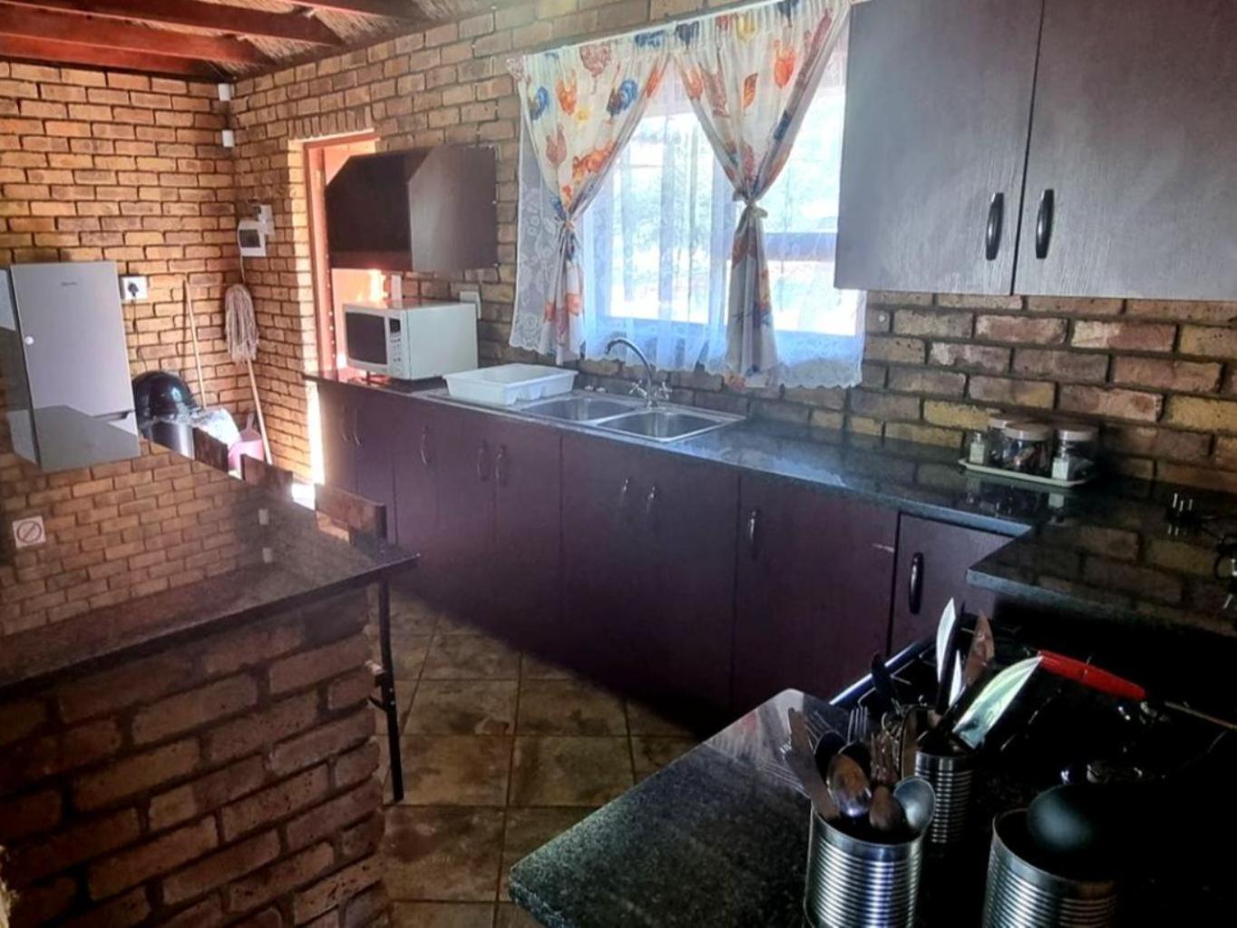 Three-Bedroom House - Photo 19