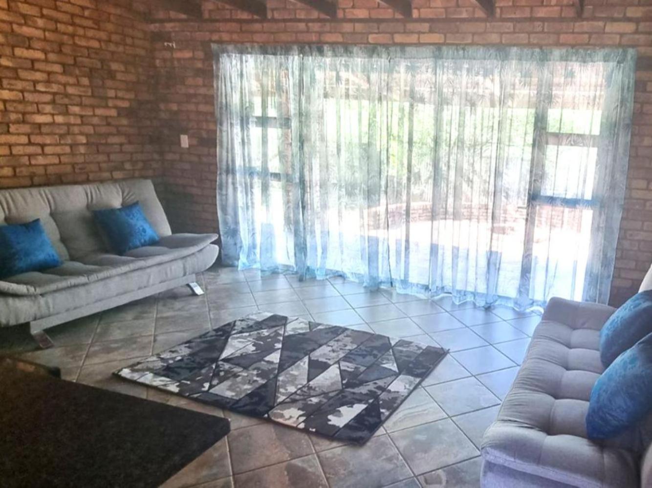 Three-Bedroom House - Photo 18