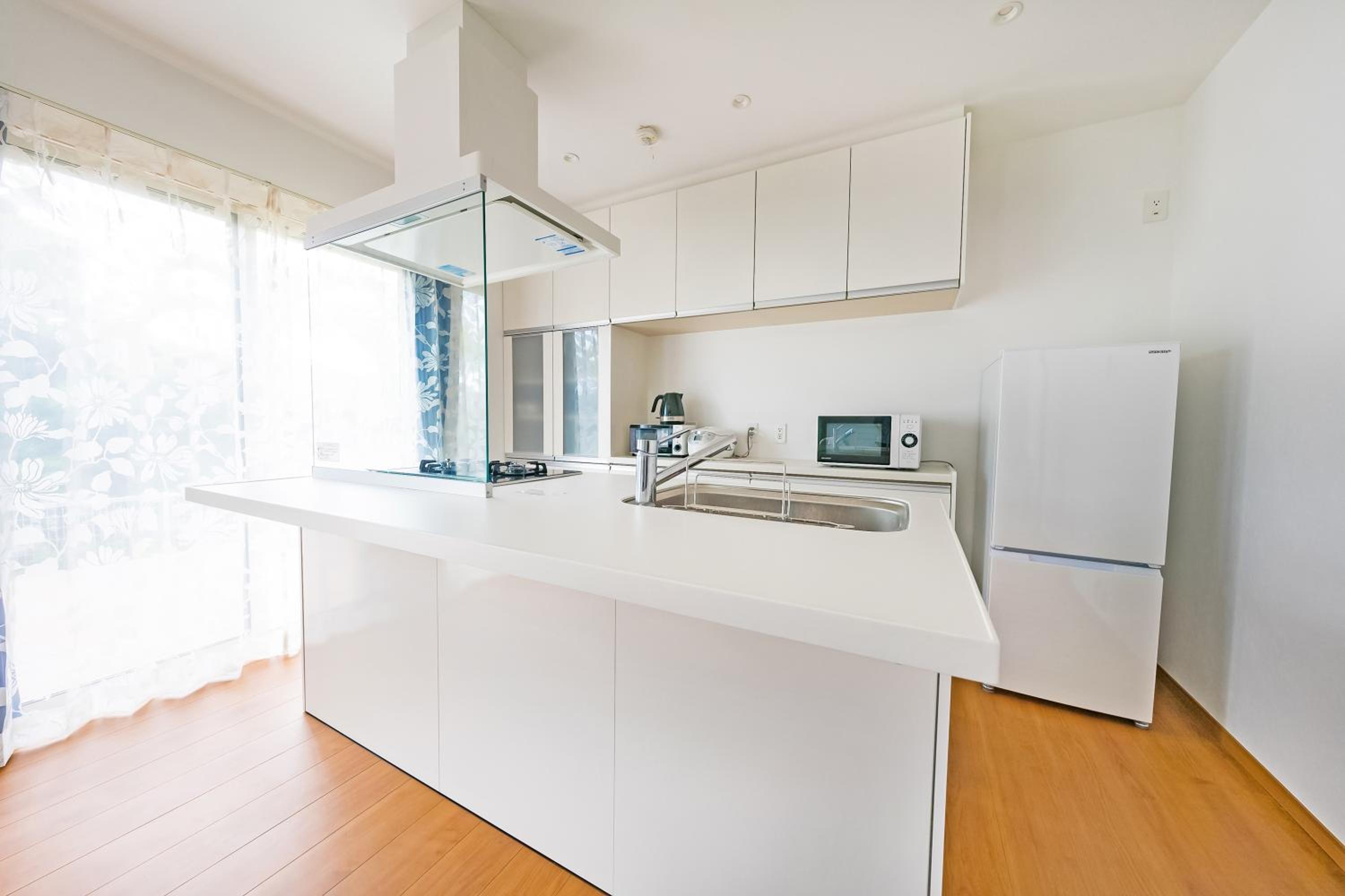 Three-Bedroom House - Photo 18