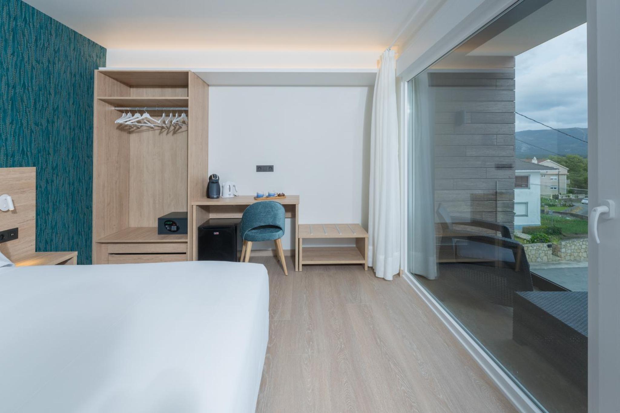 Habitación Doble Deluxe con Balcón y Vista al Mar