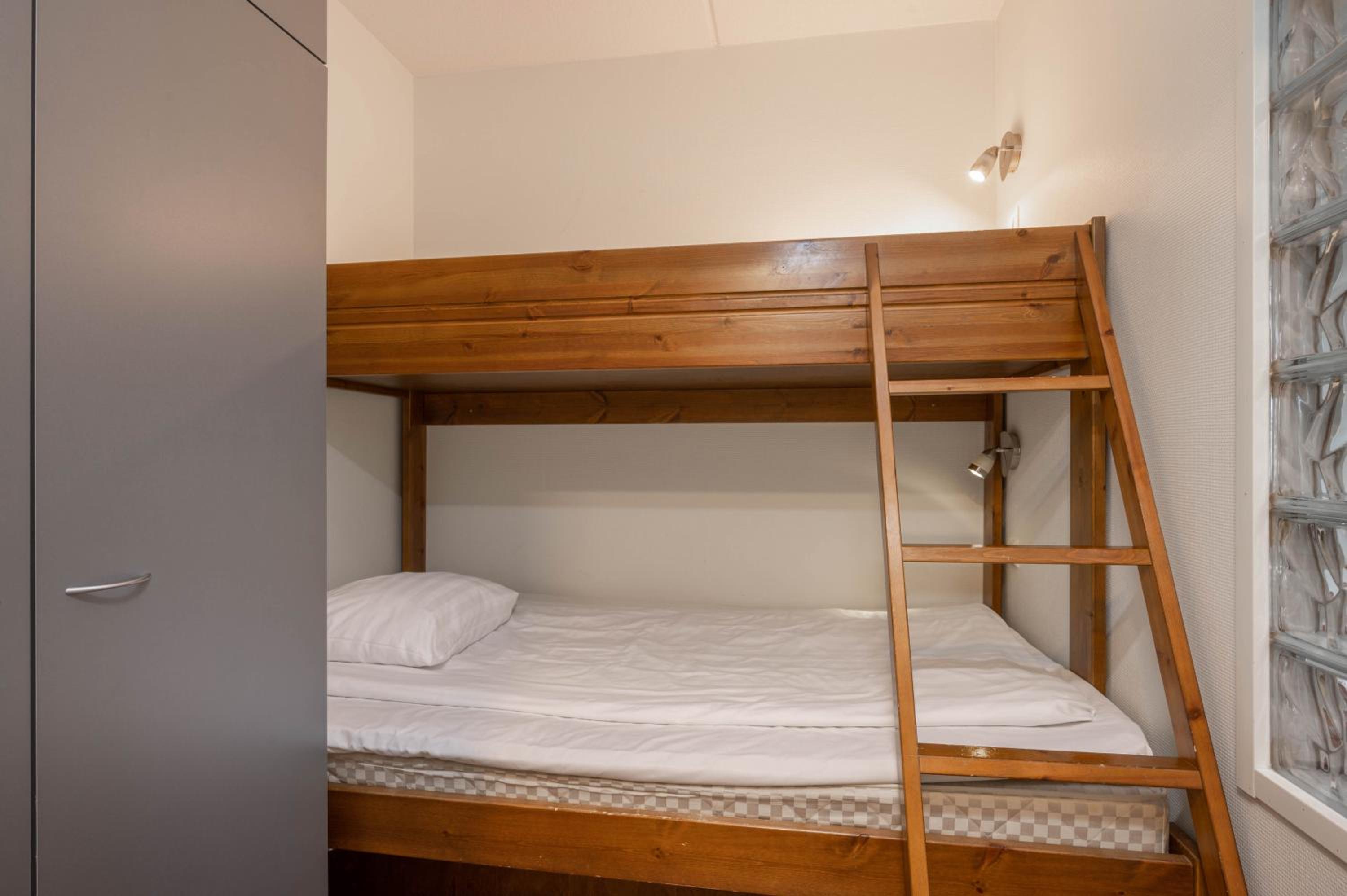 Three-Bedroom Apartment - Photo 14