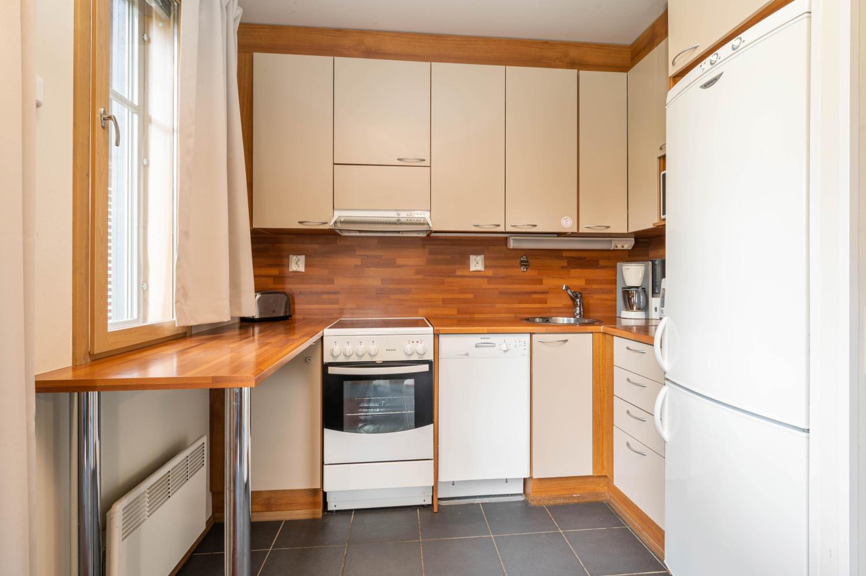 Three-Bedroom Apartment - Photo 10