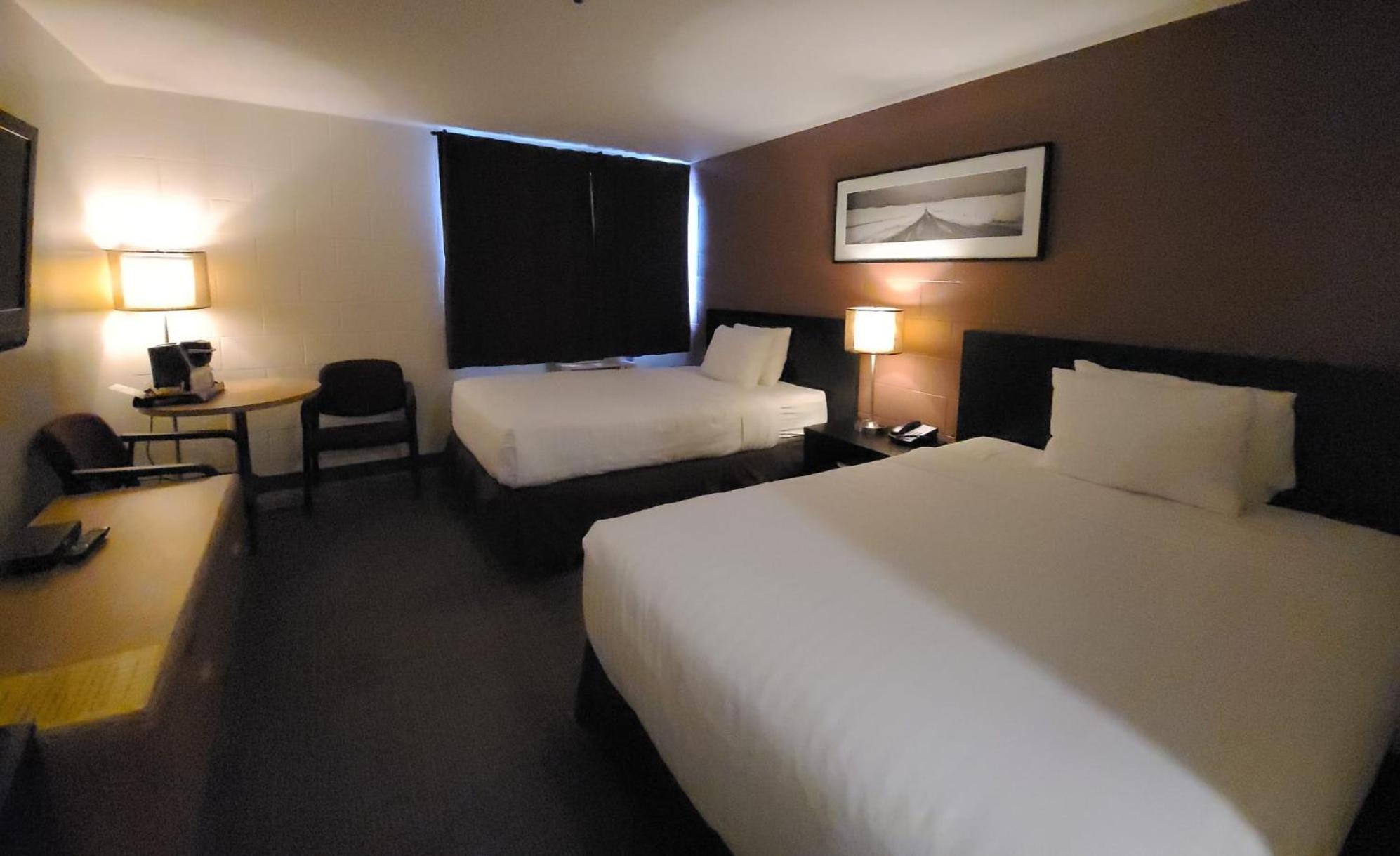 Standard Quadruple Room - Non Pet Friendly - Photo 1