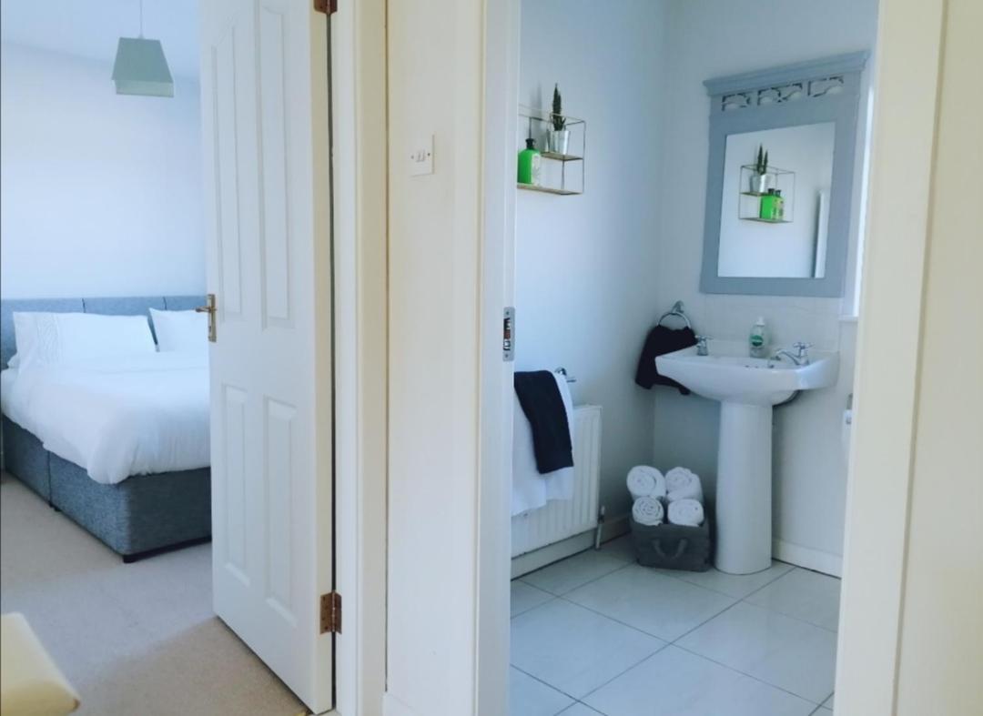 Three-Bedroom House - Photo 16