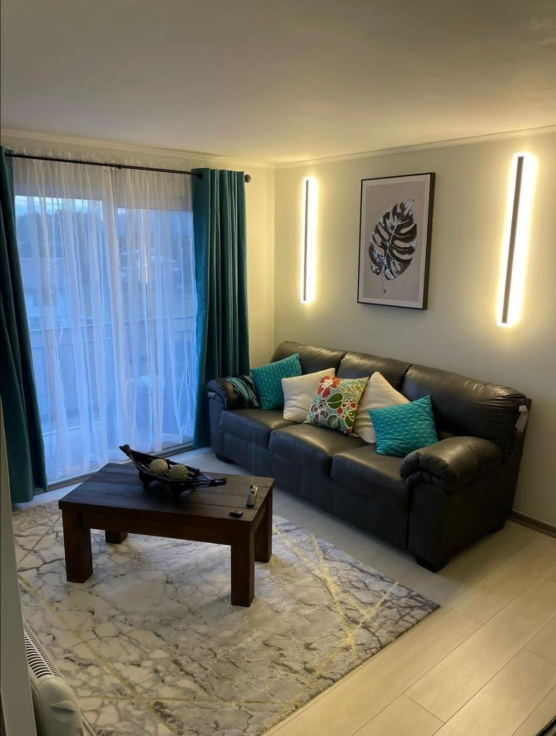 Three-Bedroom Apartment photo 1