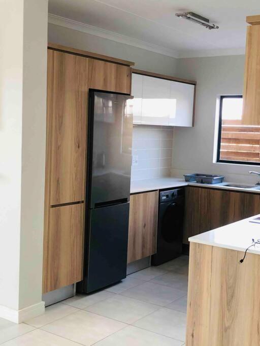 Three-Bedroom Apartment - Photo 8