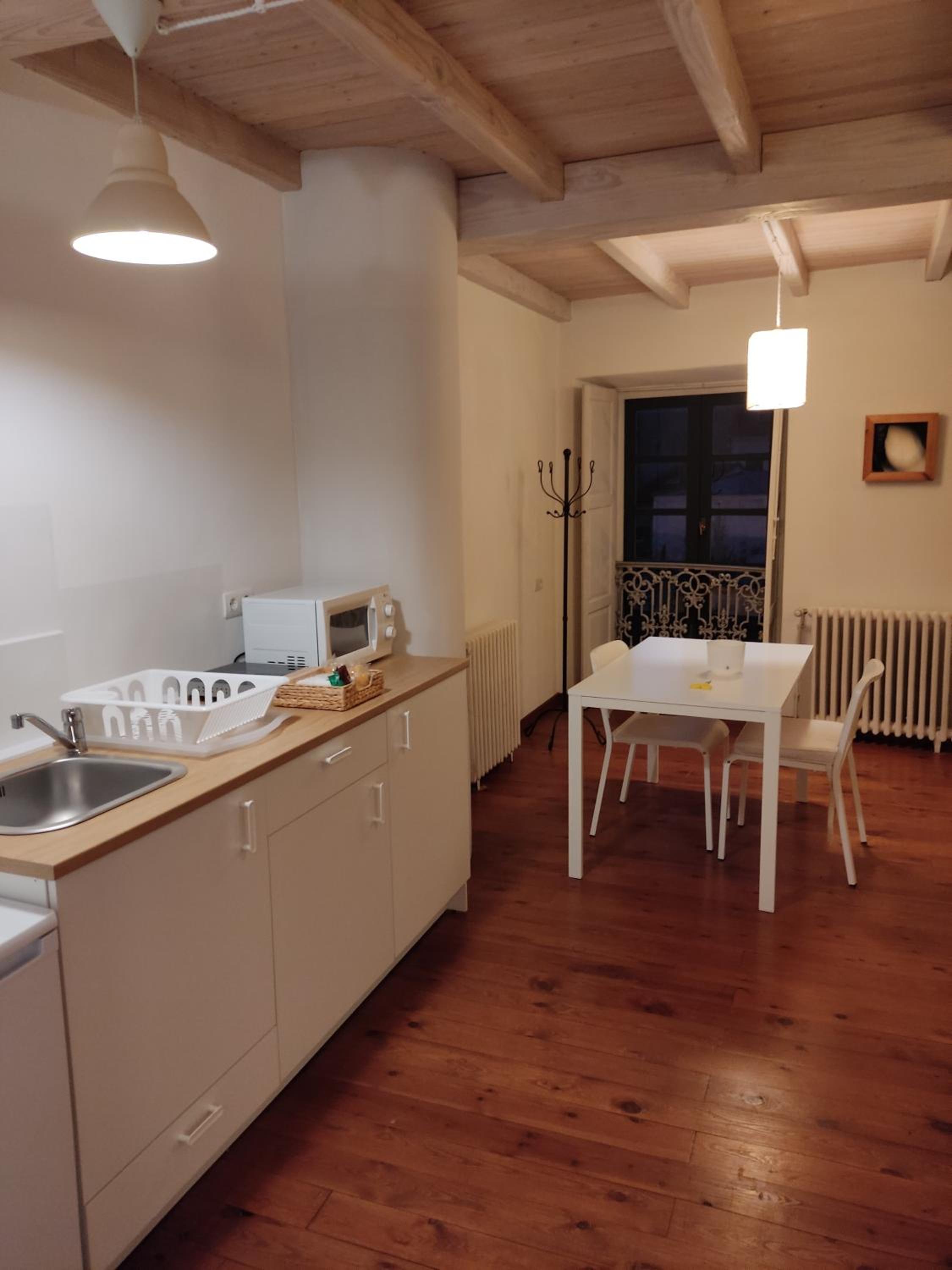 Apartment with Balcony - Photo 13