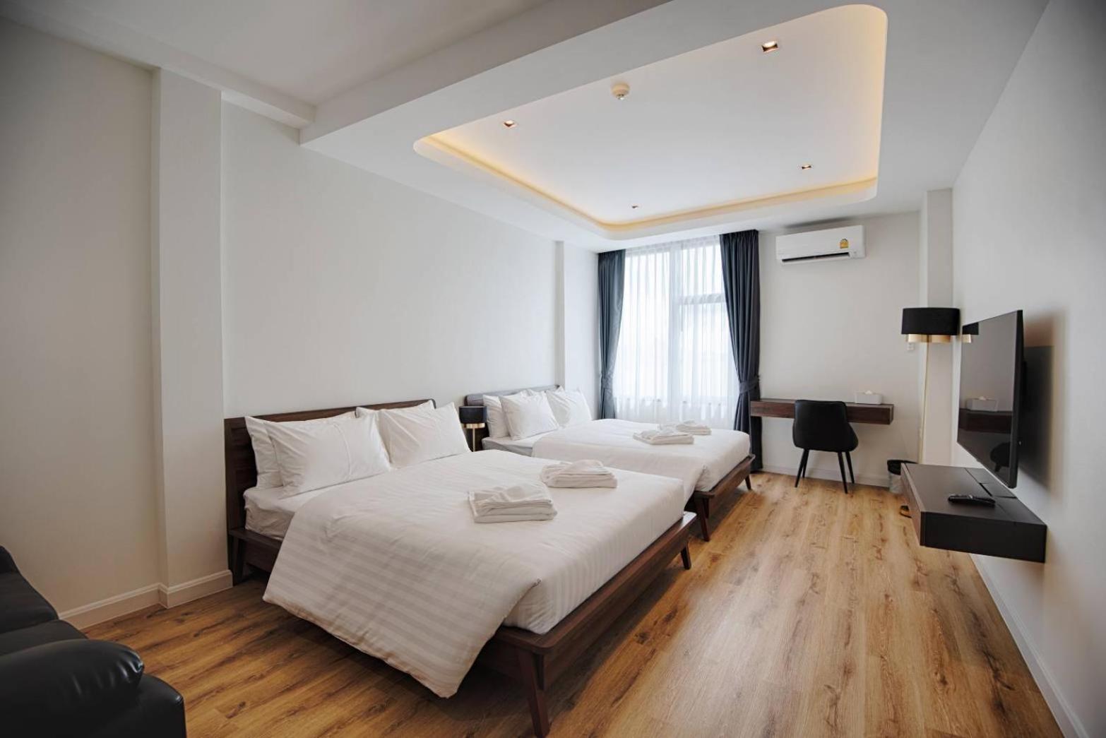 Deluxe Queen Room with Two Queen Beds - Photo 1