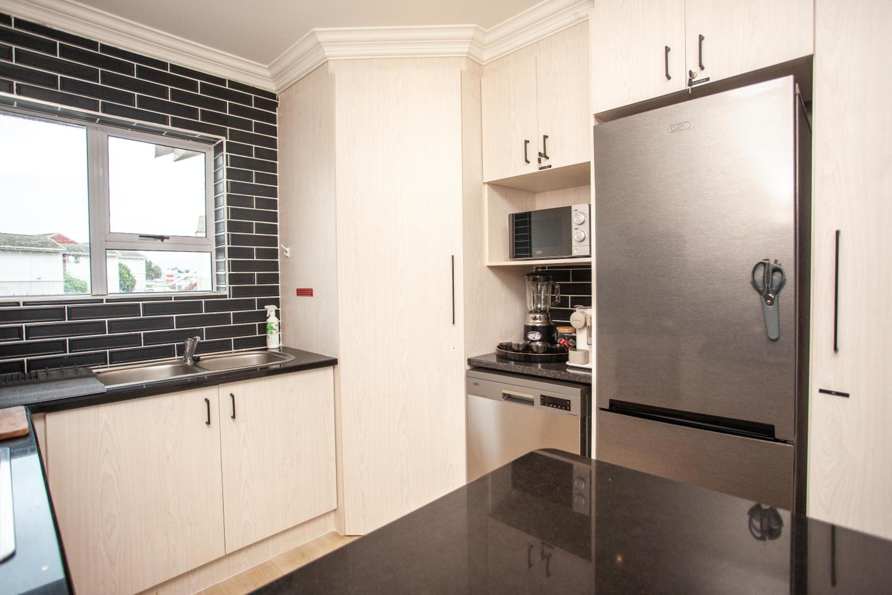 Two-Bedroom Apartment - Photo 31