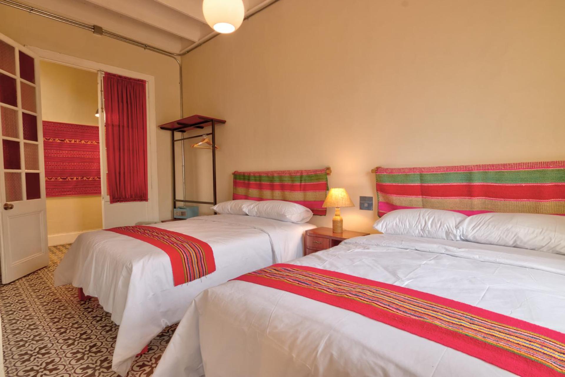 Twin Room with Two Double Beds photo 3