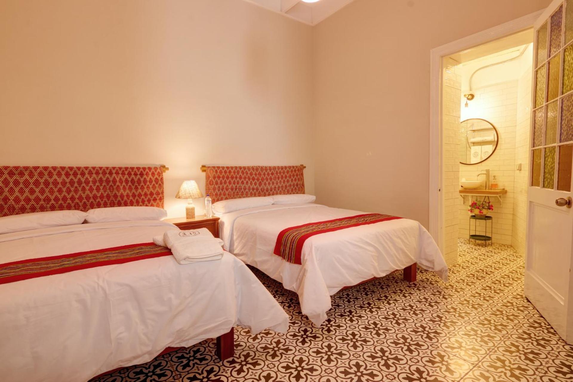 Twin Room with Two Double Beds photo 1