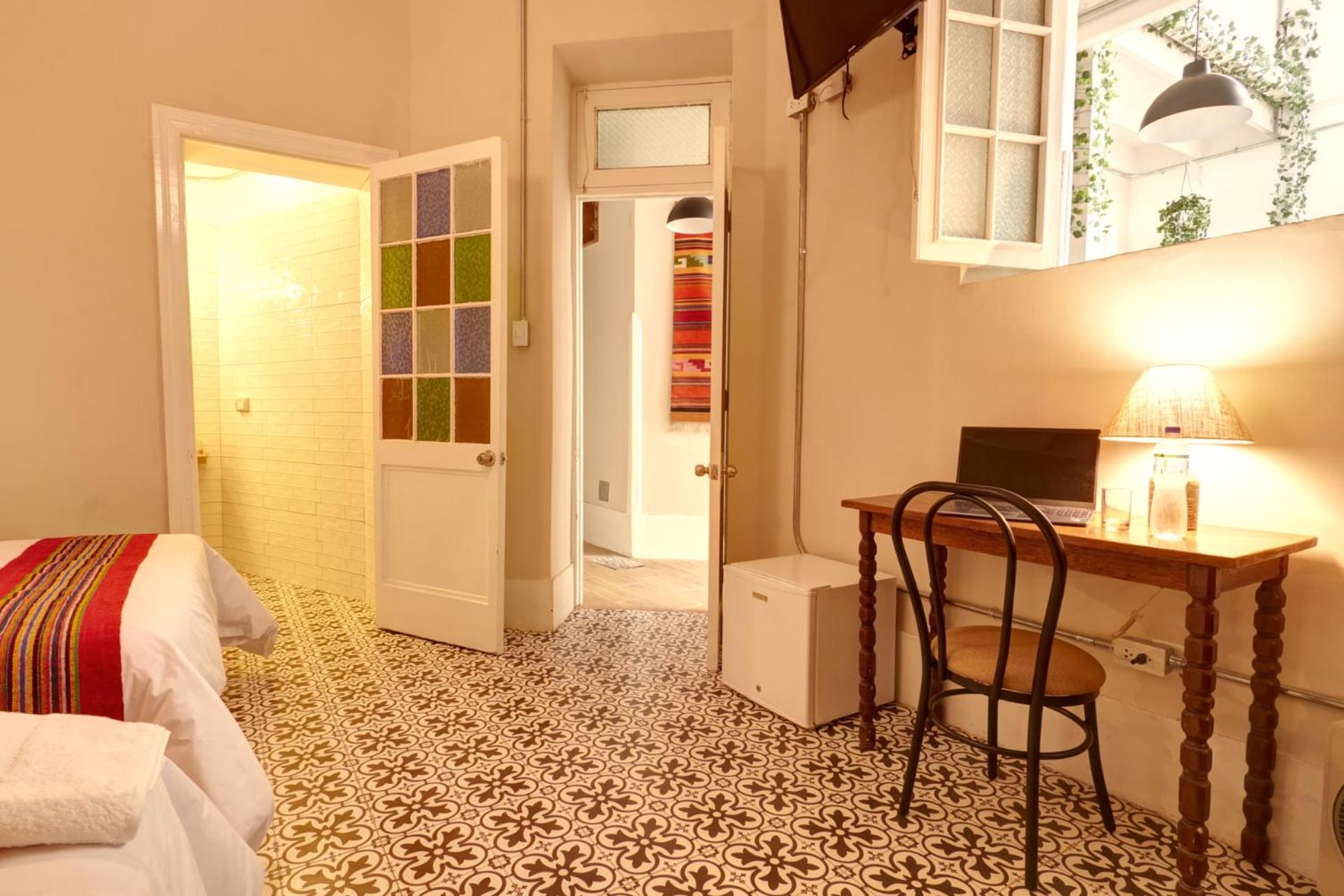 Twin Room with Two Double Beds photo 2