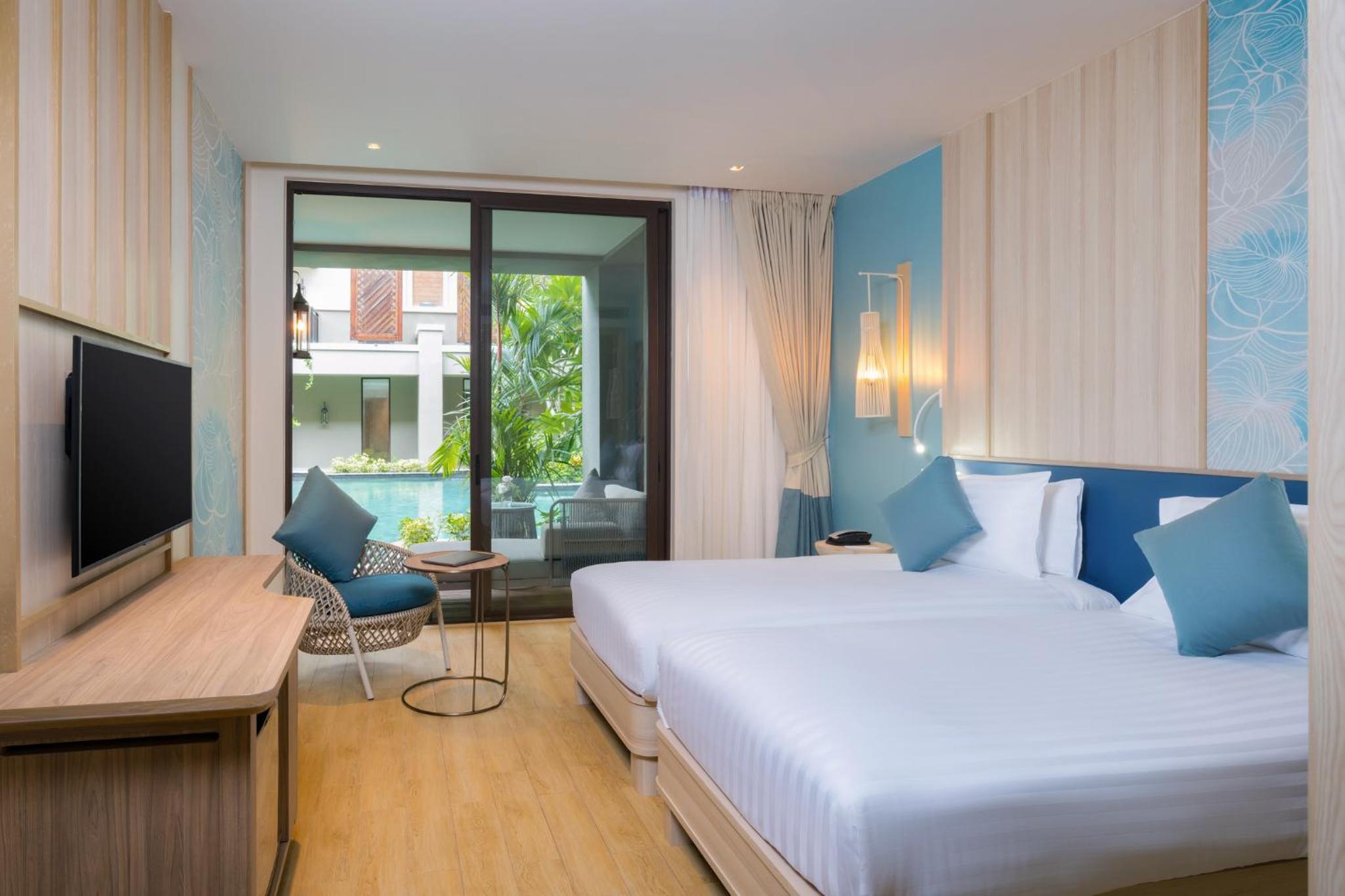 Deluxe Twin Room with Pool Access - Beach Side - Photo 1