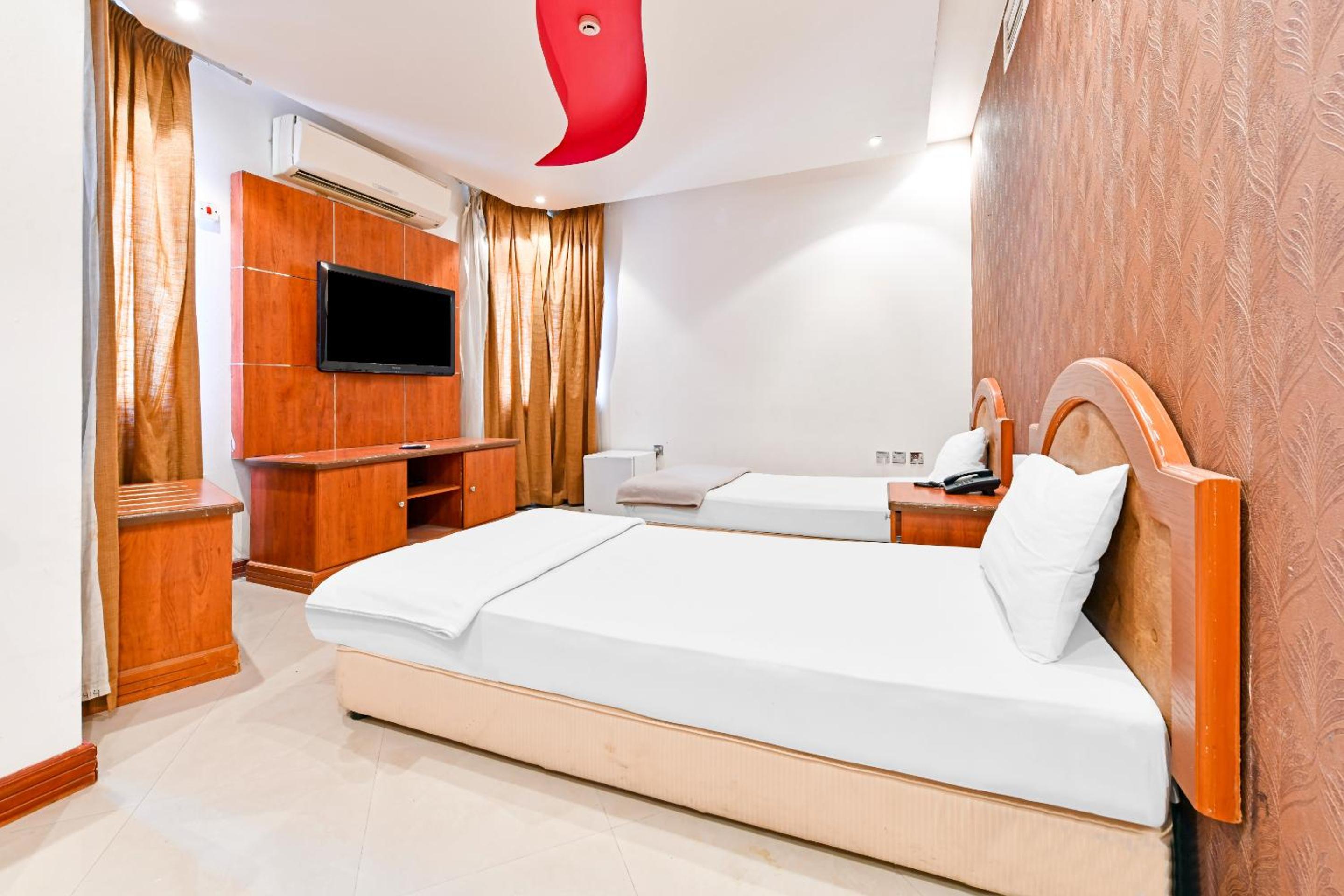 Deluxe Twin Room - Photo 10