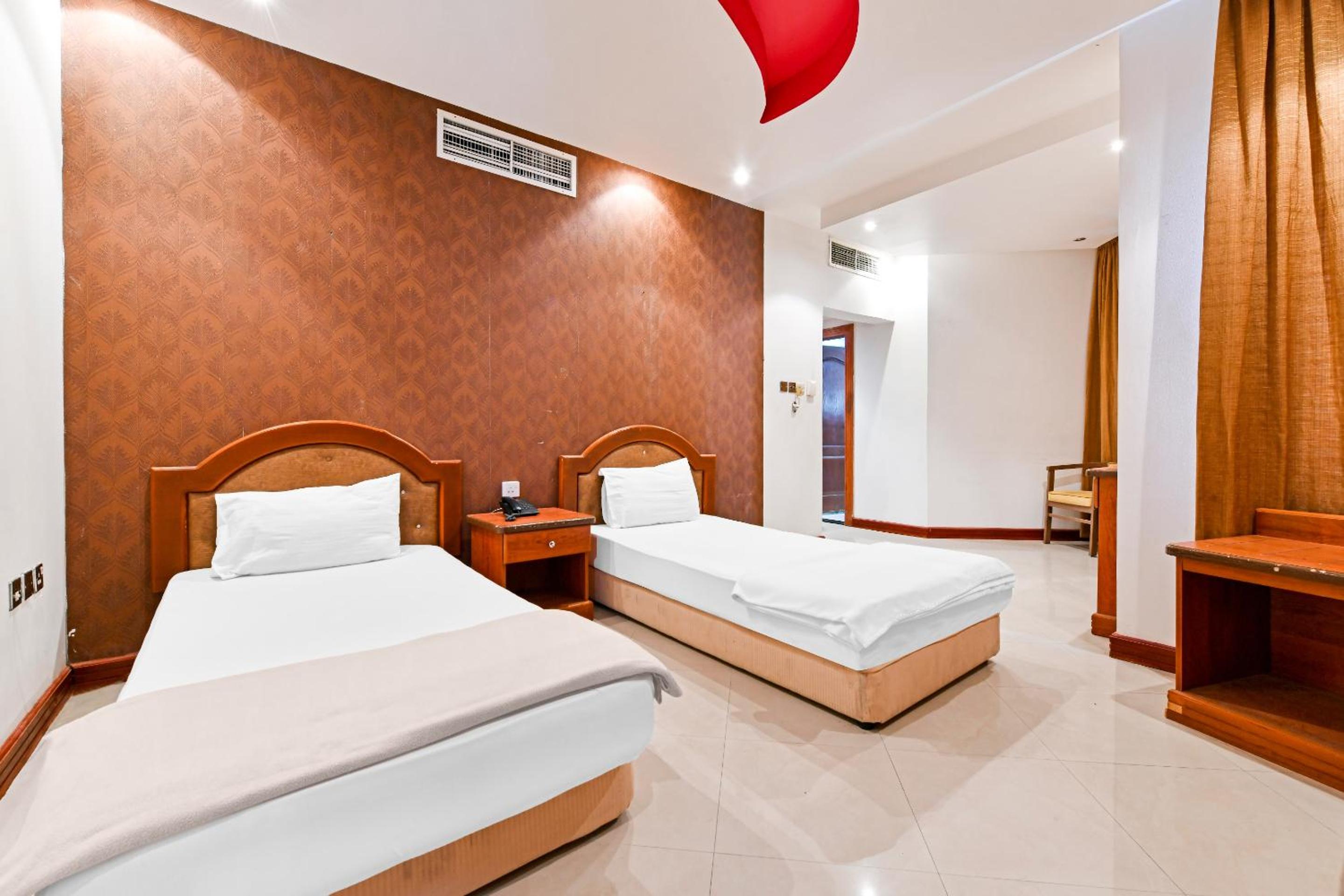 Deluxe Twin Room - Photo 16