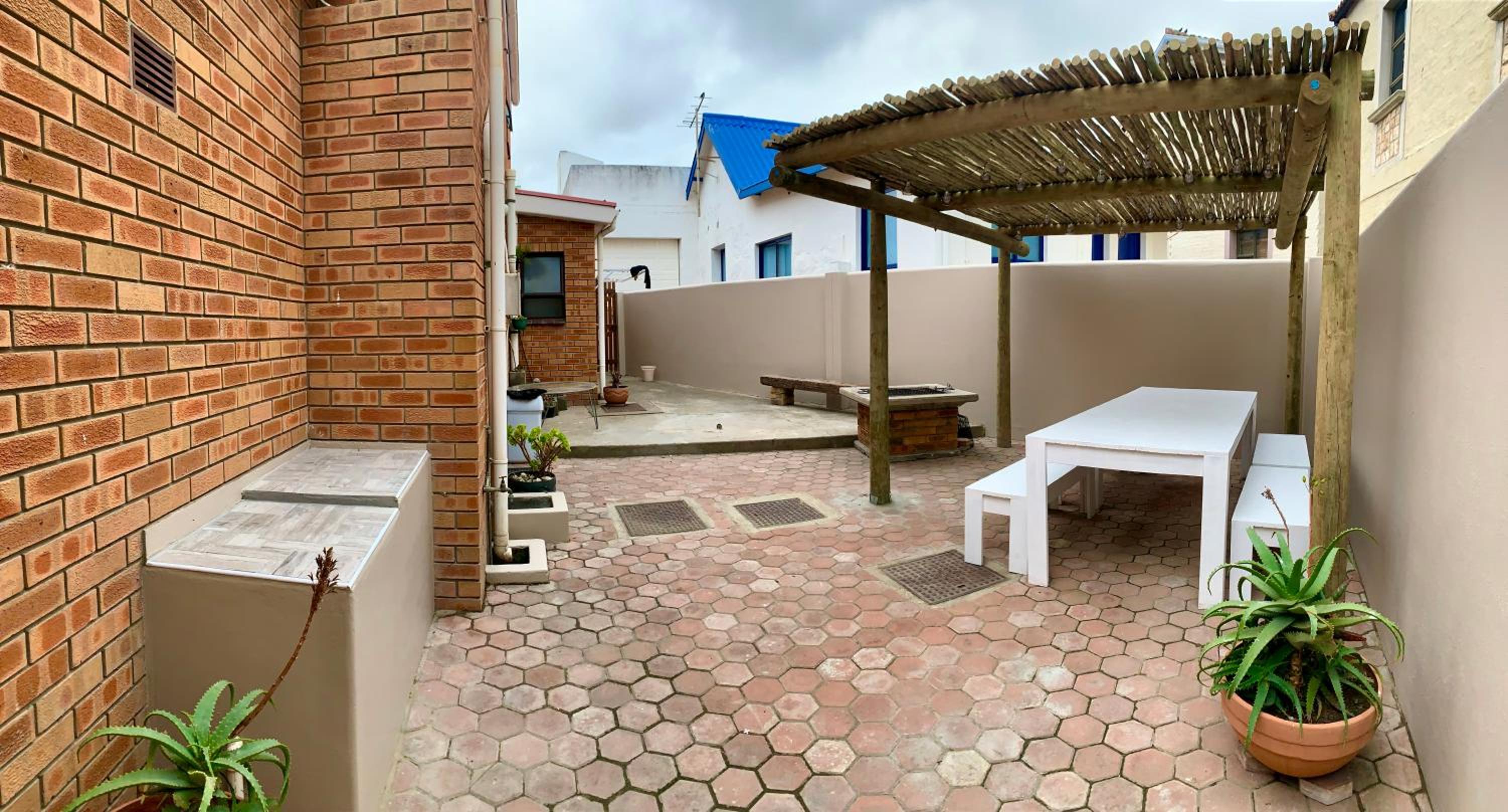 Three-Bedroom House - Photo 32