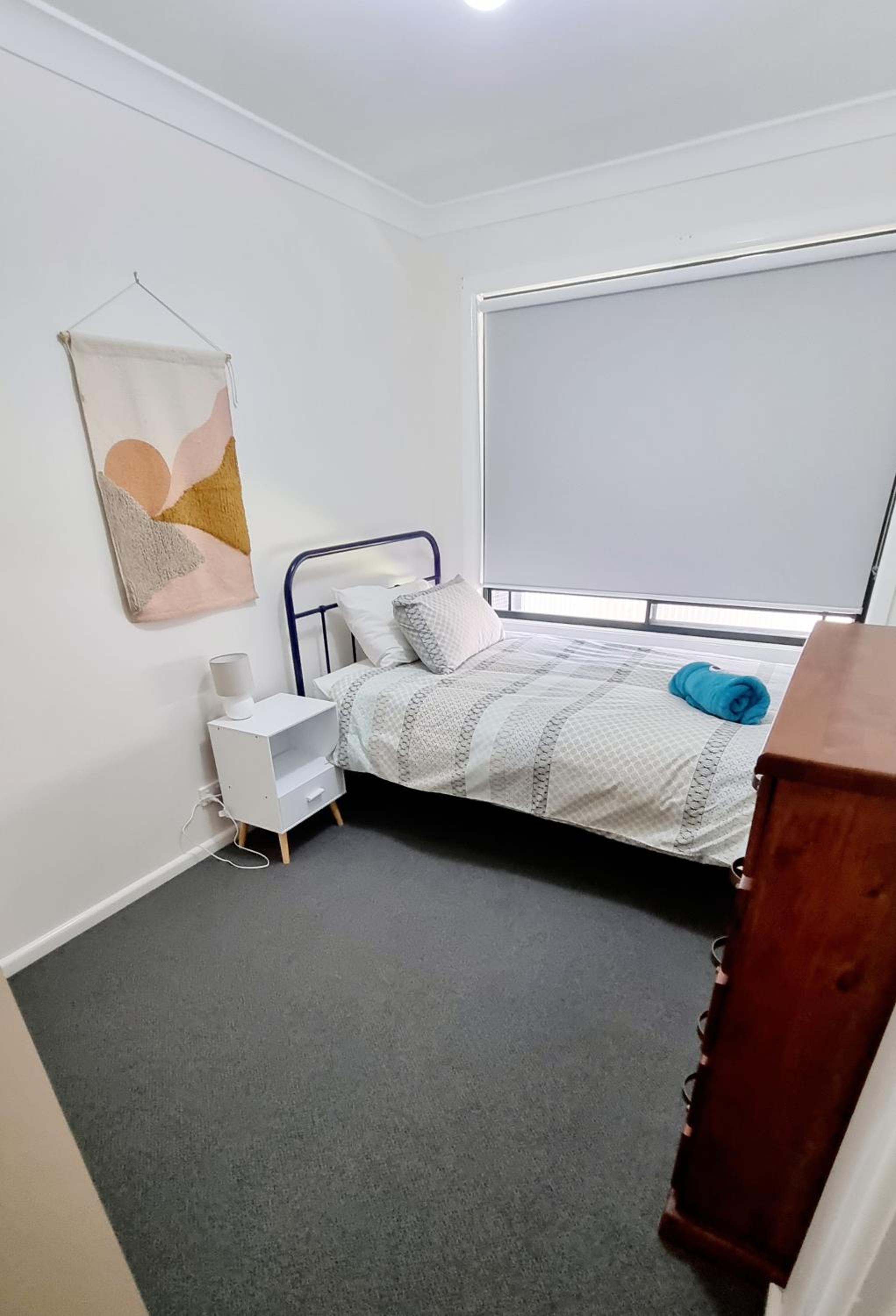 Three-Bedroom House - Photo 4