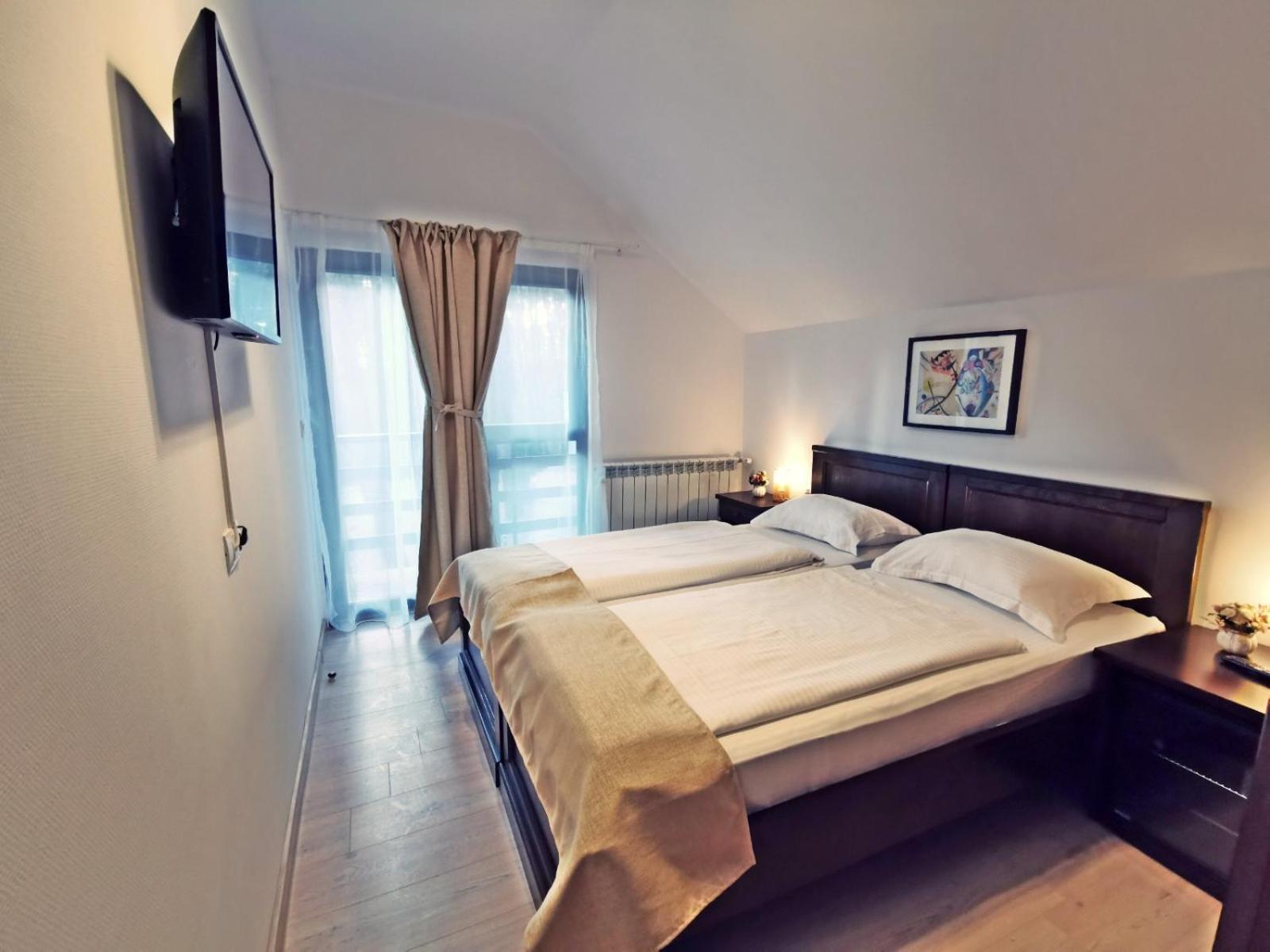 Deluxe Double Room with Balcony - Photo 1