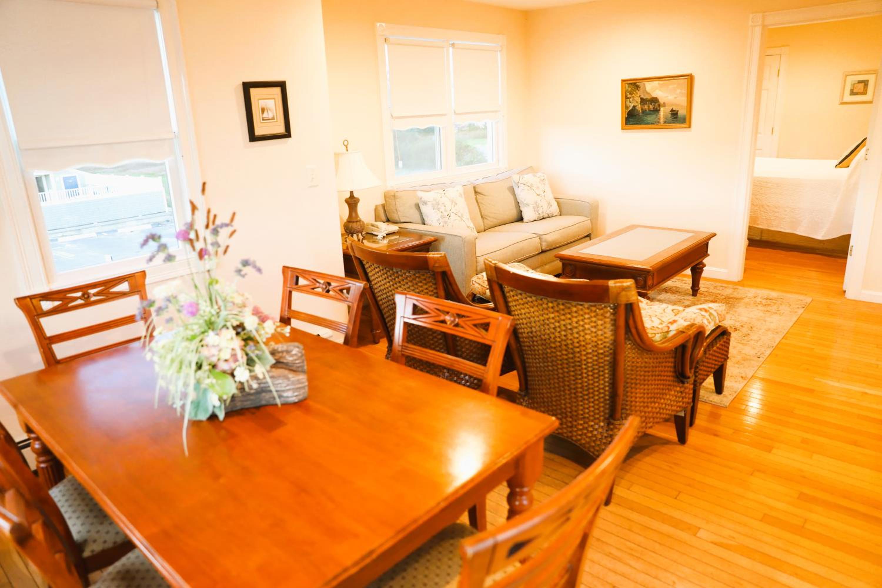 Two-Bedroom Suite with Kitchen, Balcony, and Partial Ocean View – 2B