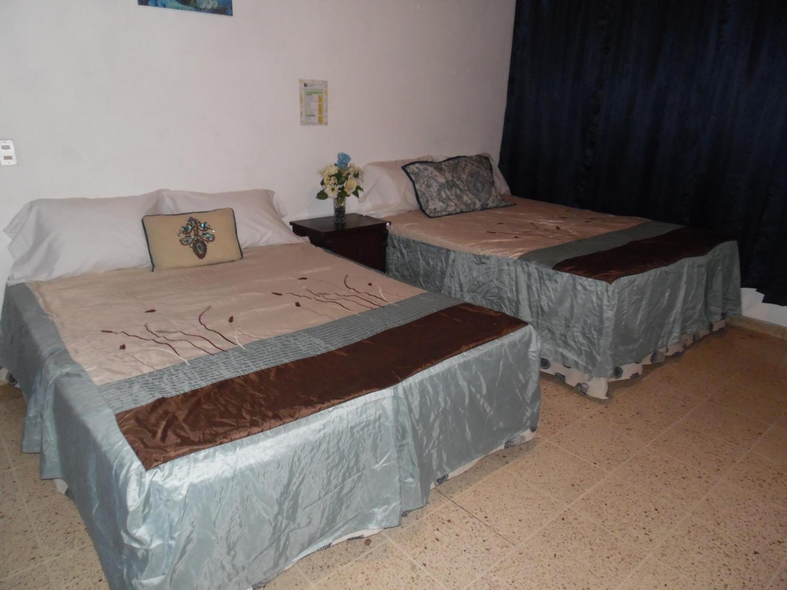 Quadruple Room with Private Bathroom photo 1