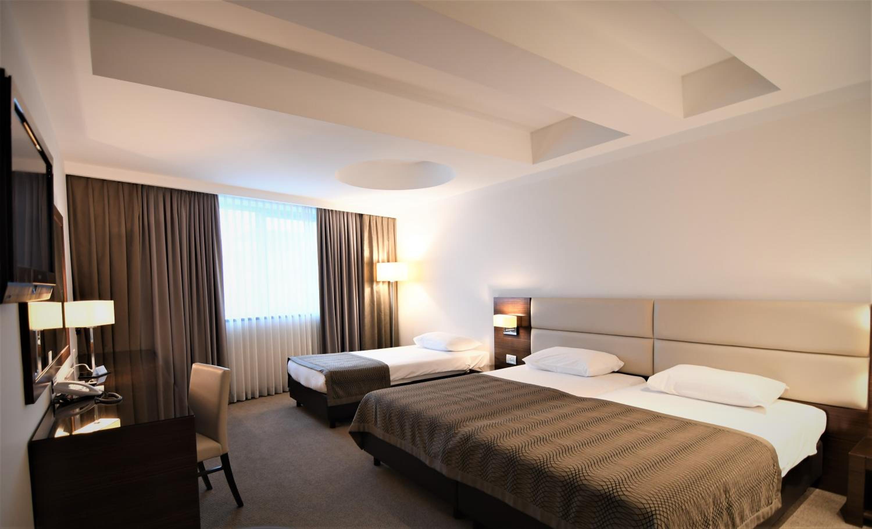 Deluxe Triple Room - Photo 1
