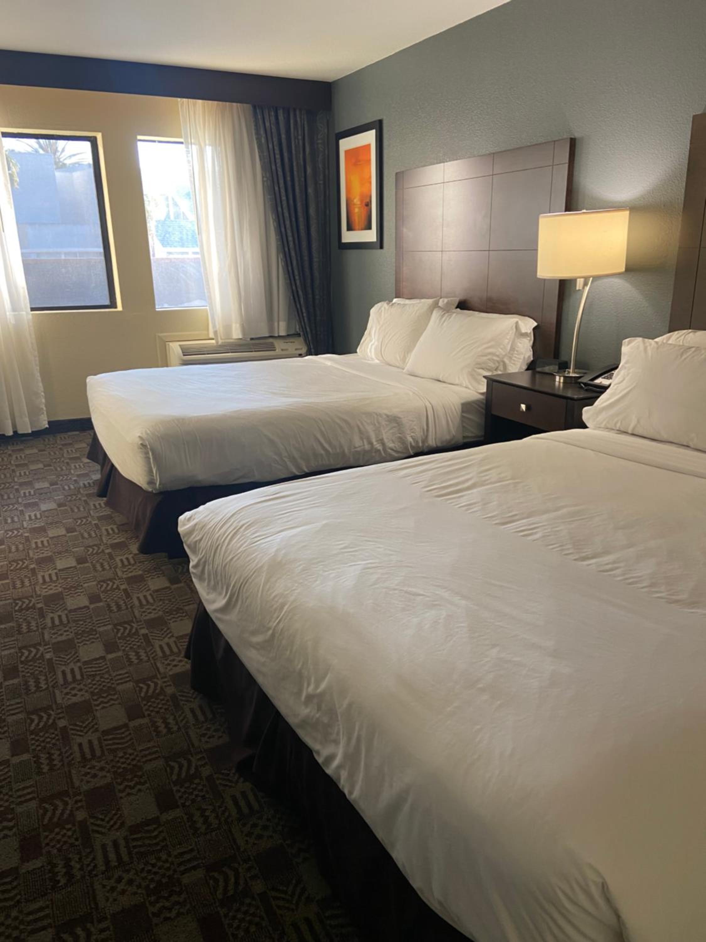 Standard Queen Room with Two Queen Beds and Balcony - Photo 1
