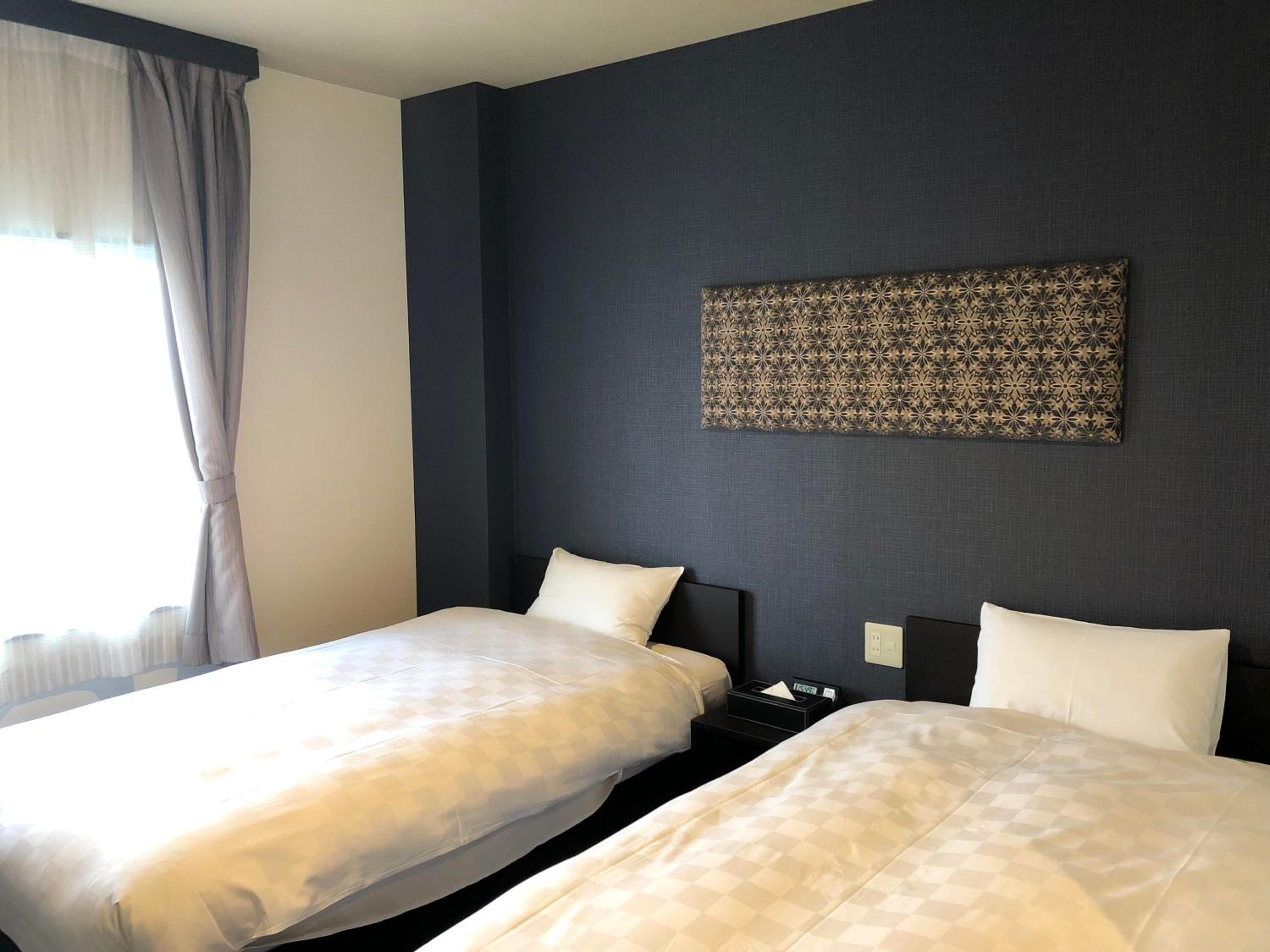 Standard Twin Room - Photo 2