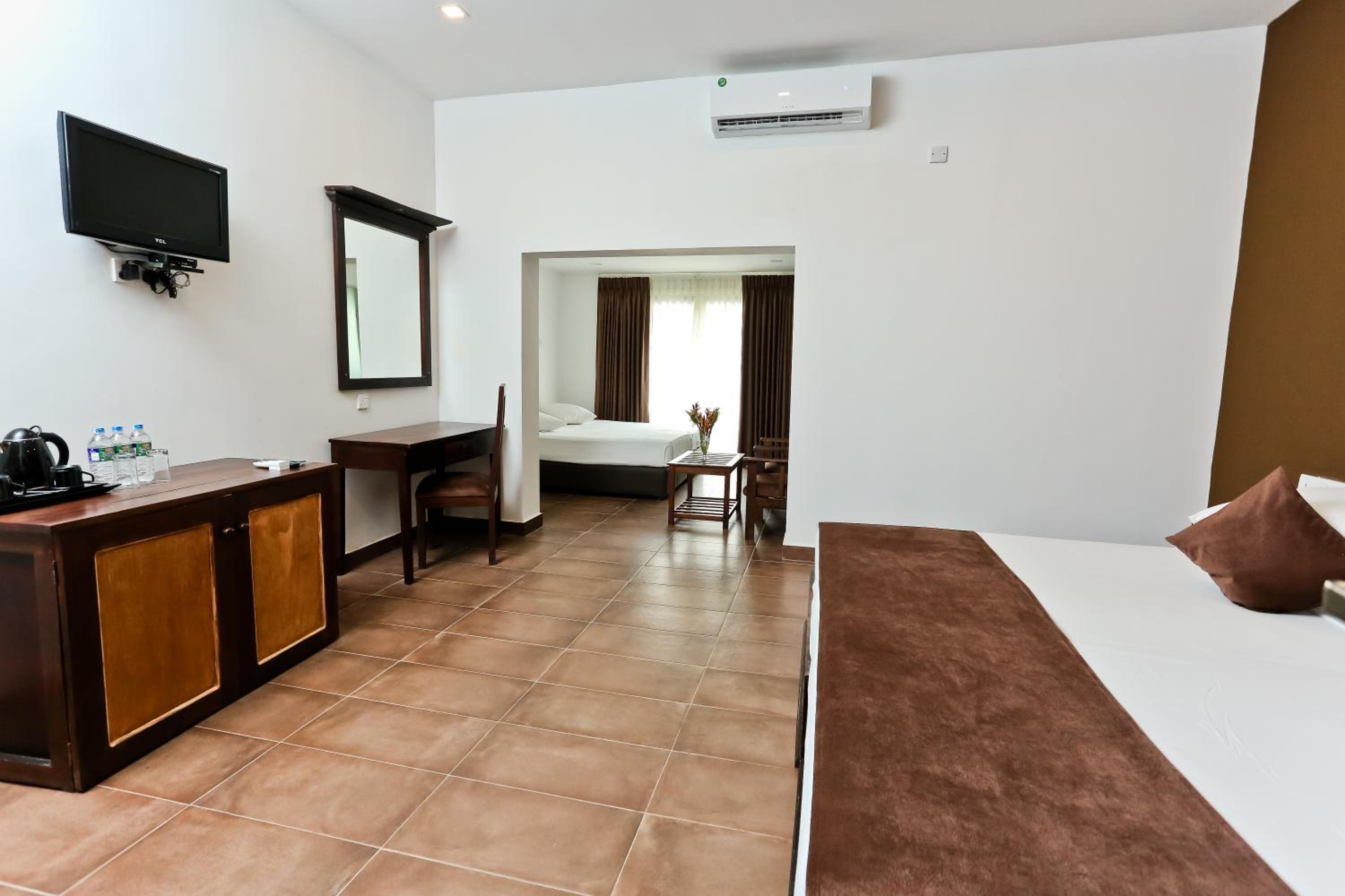 Family Room with Balcony - Photo 2