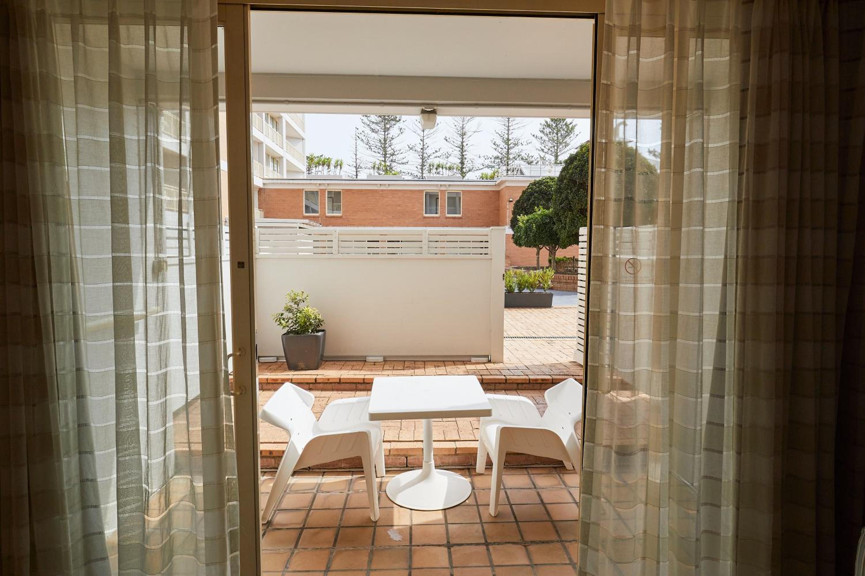 Standard Queen Room with Two Queen Beds and Balcony - Photo 7