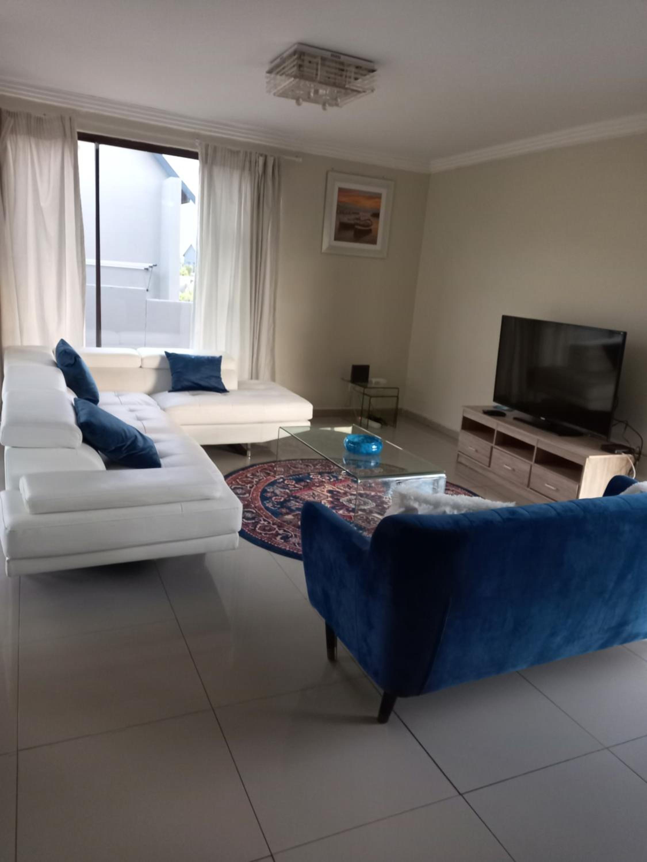Three-Bedroom House - Photo 37
