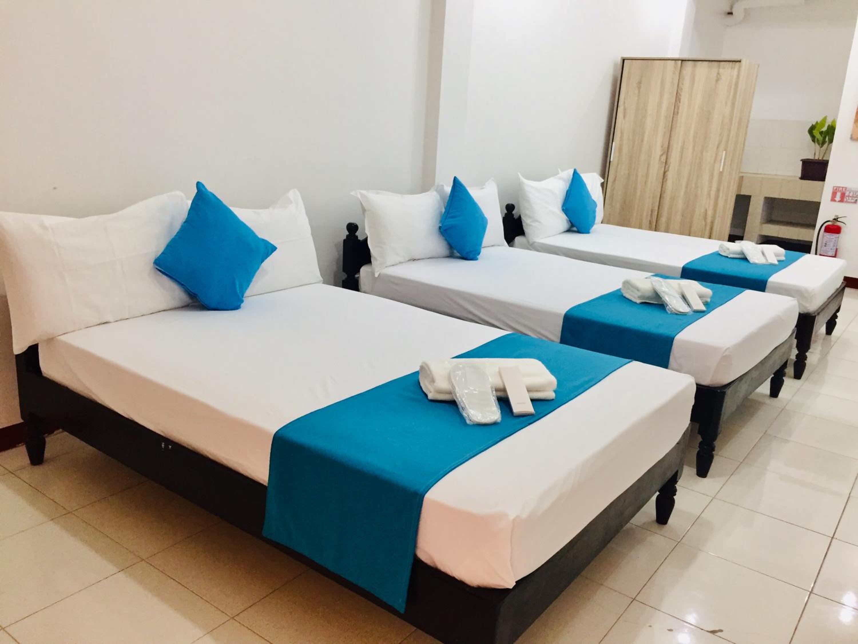Deluxe Triple Room - Photo 2