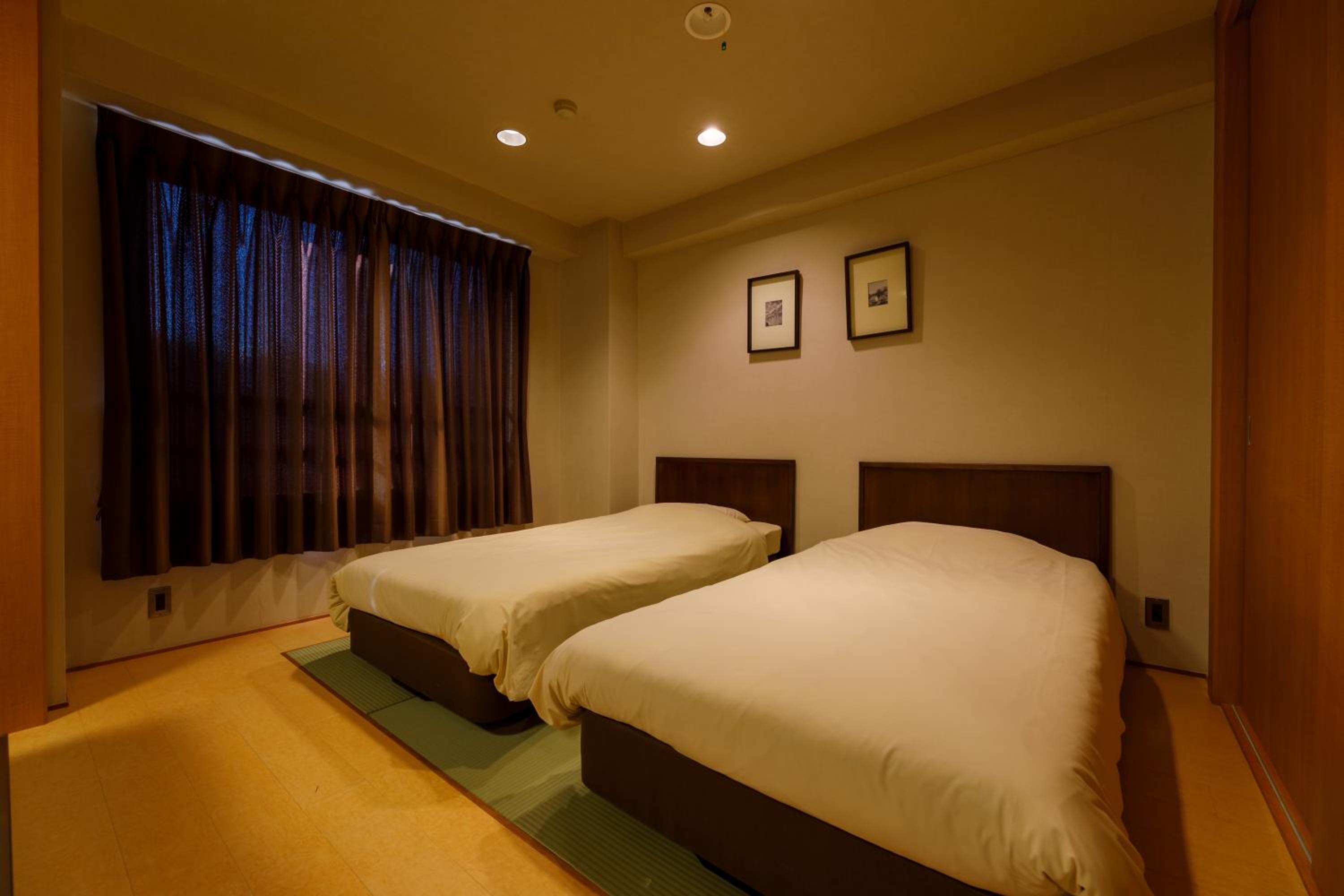 Twin Room - Non-Smoking - Photo 3