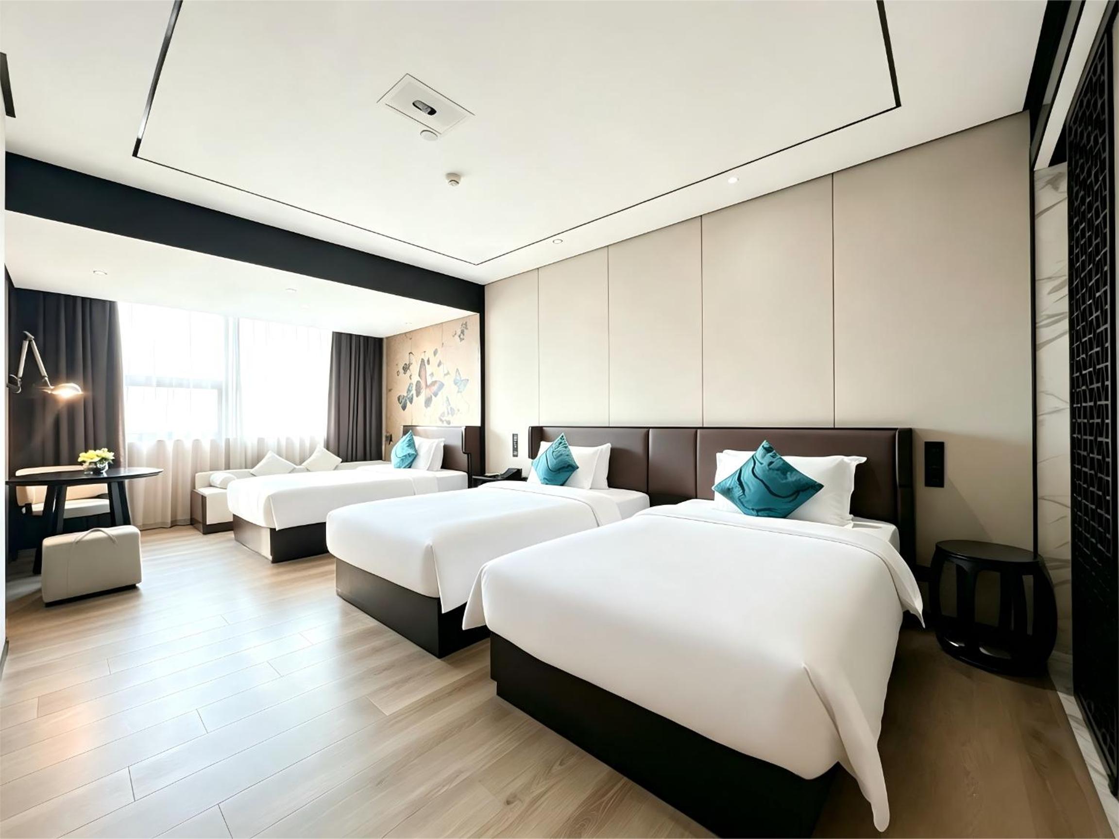 Deluxe Triple Room