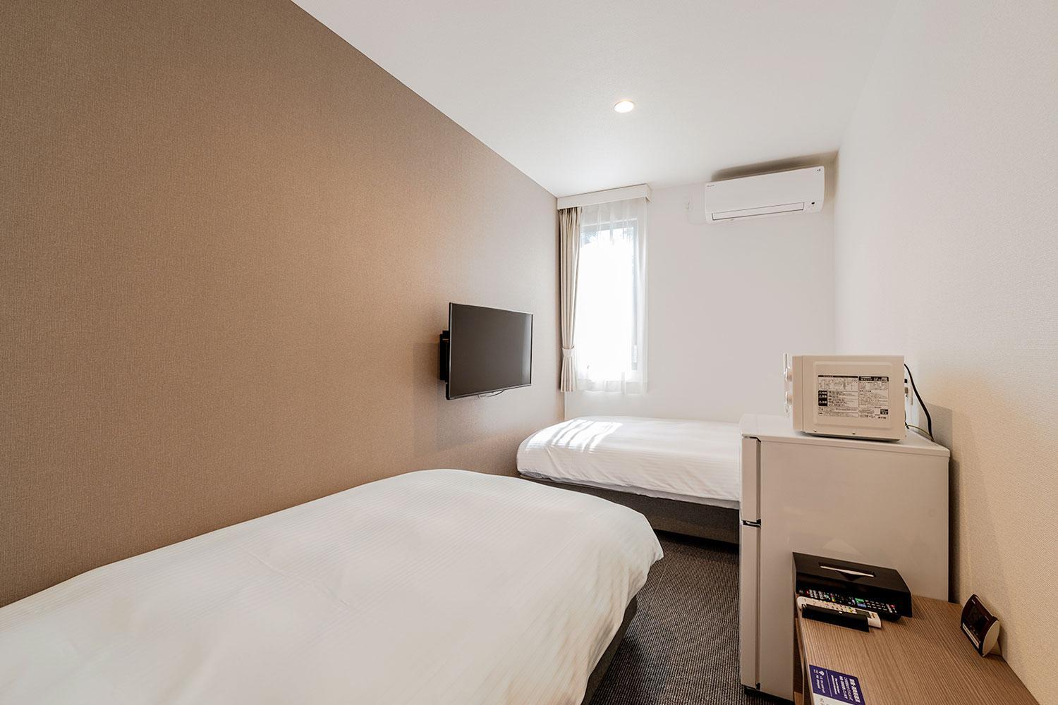 Standard Twin Room - Photo 1