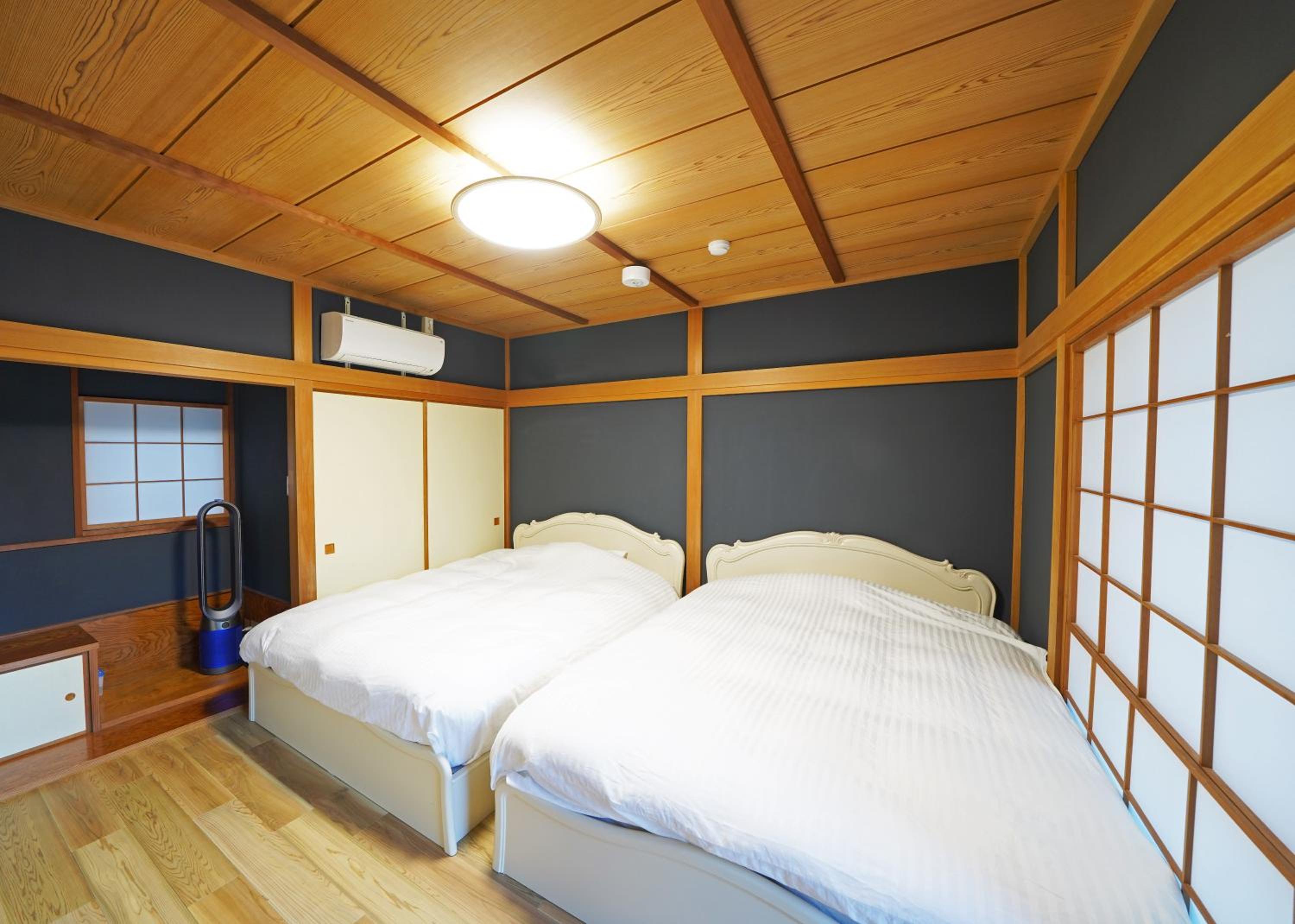 Four-Bedroom House - Photo 59