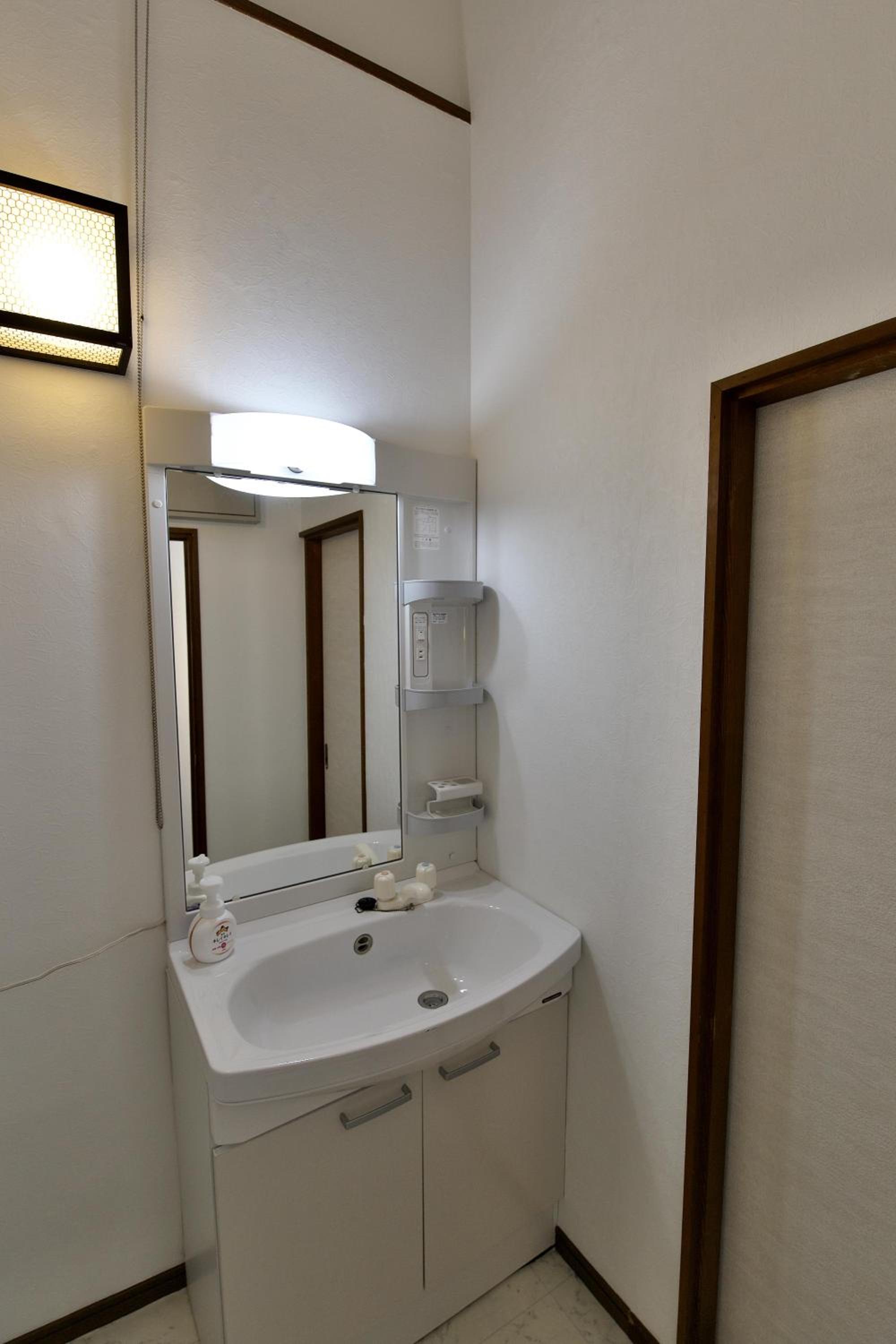 Four-Bedroom House - Photo 27