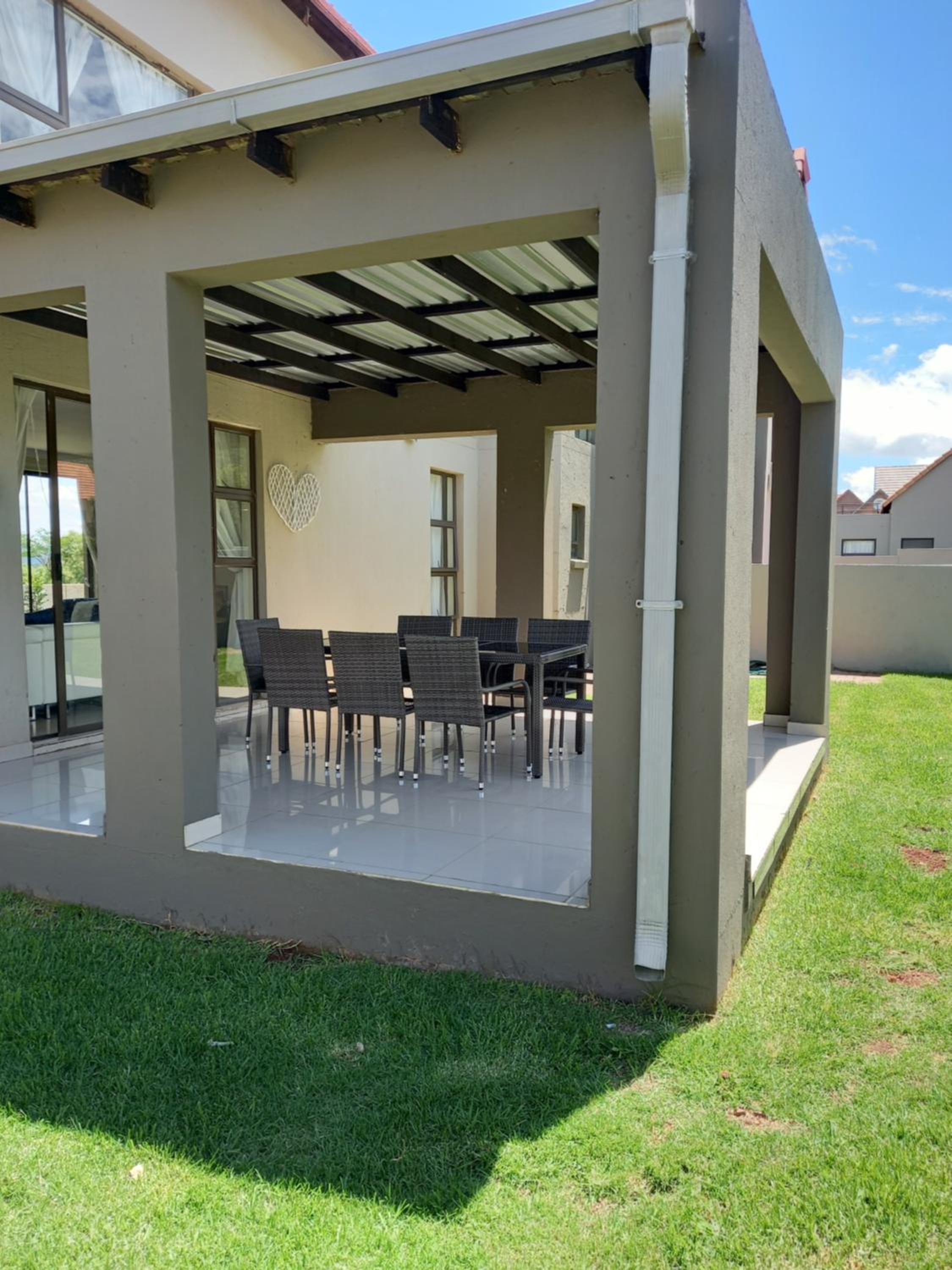 Three-Bedroom House - Photo 27