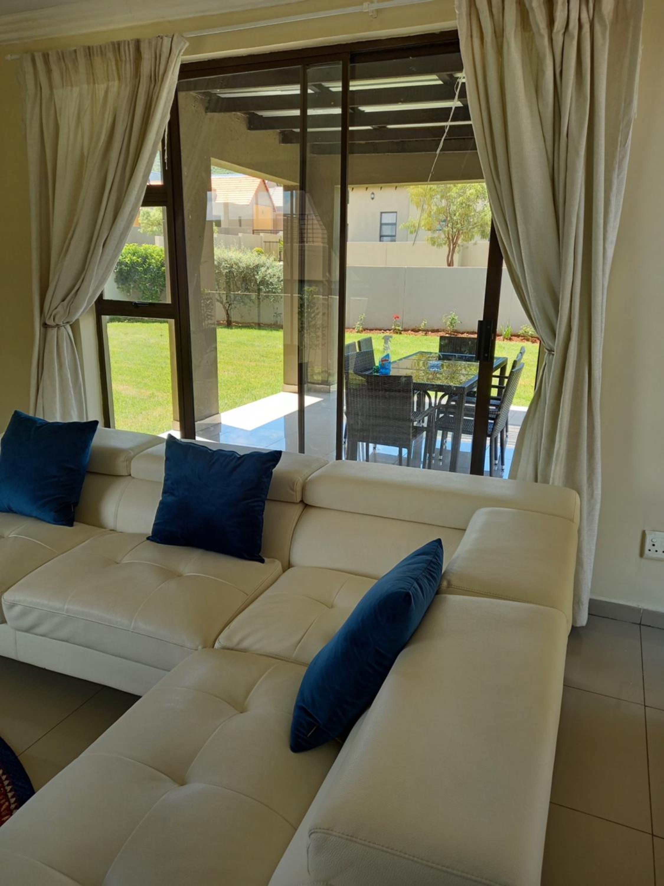 Three-Bedroom House - Photo 32
