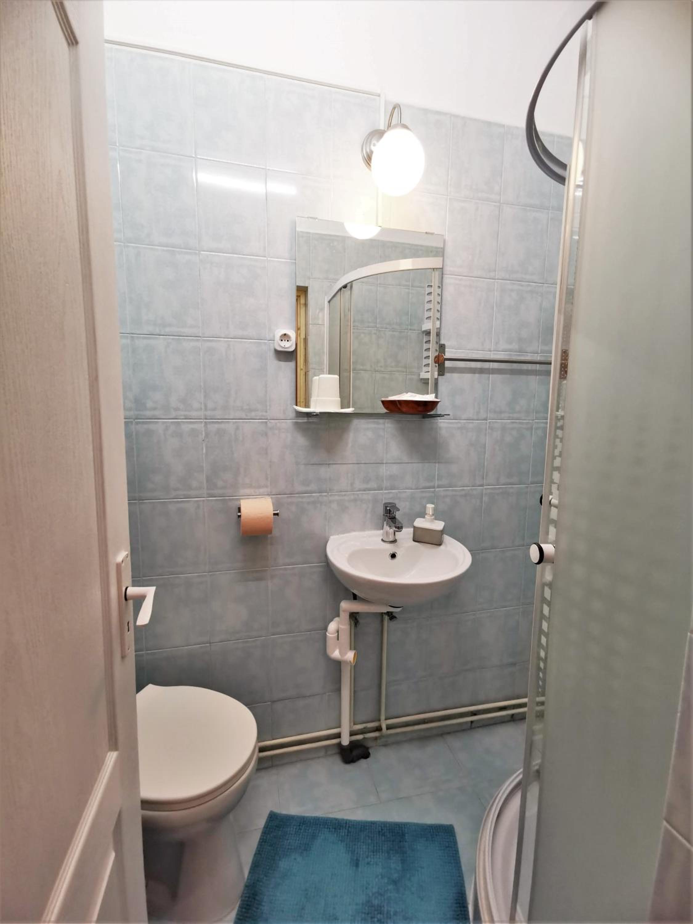 Three-Bedroom House - Photo 25