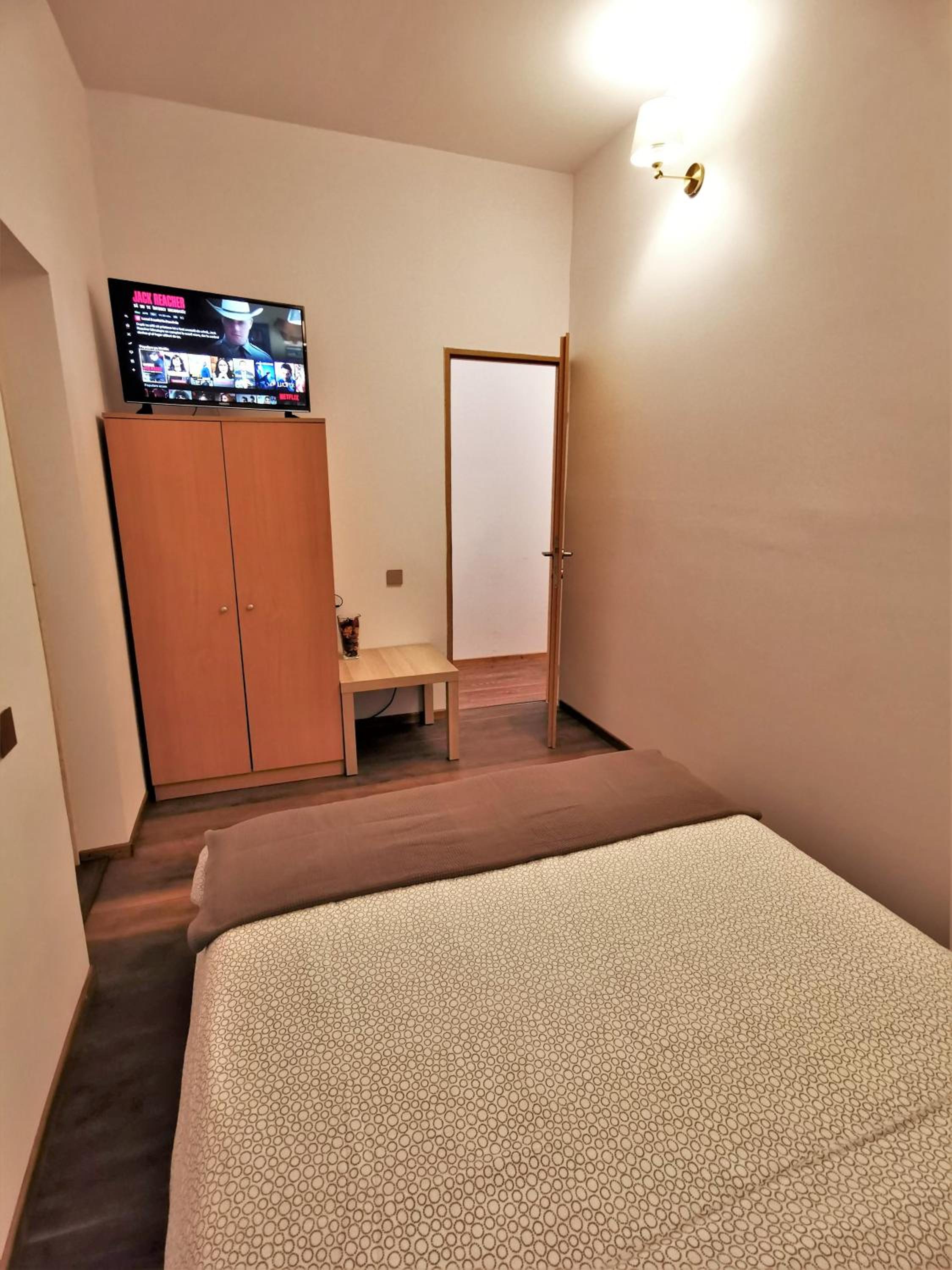 Three-Bedroom House - Photo 27