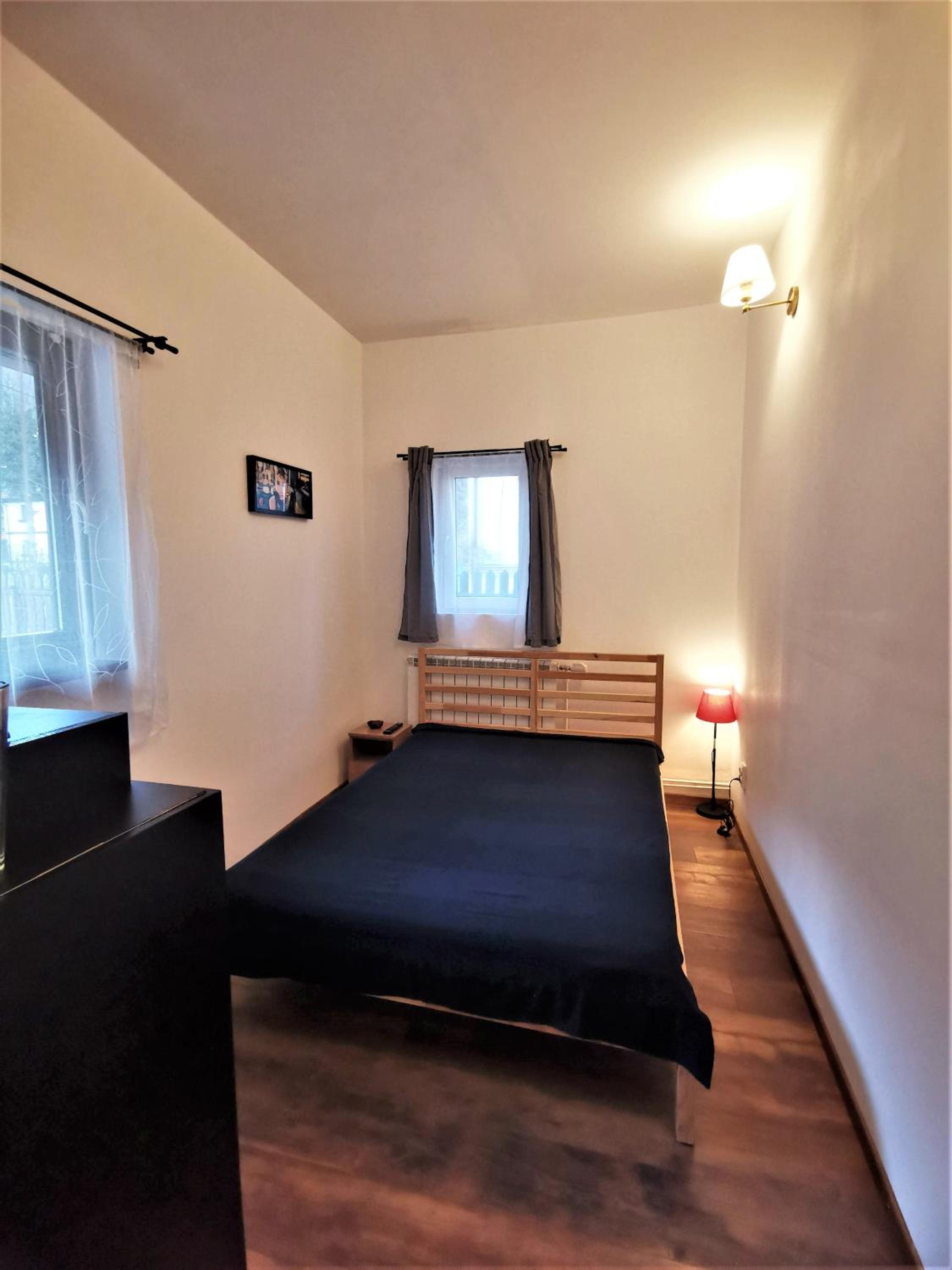 Three-Bedroom House - Photo 28