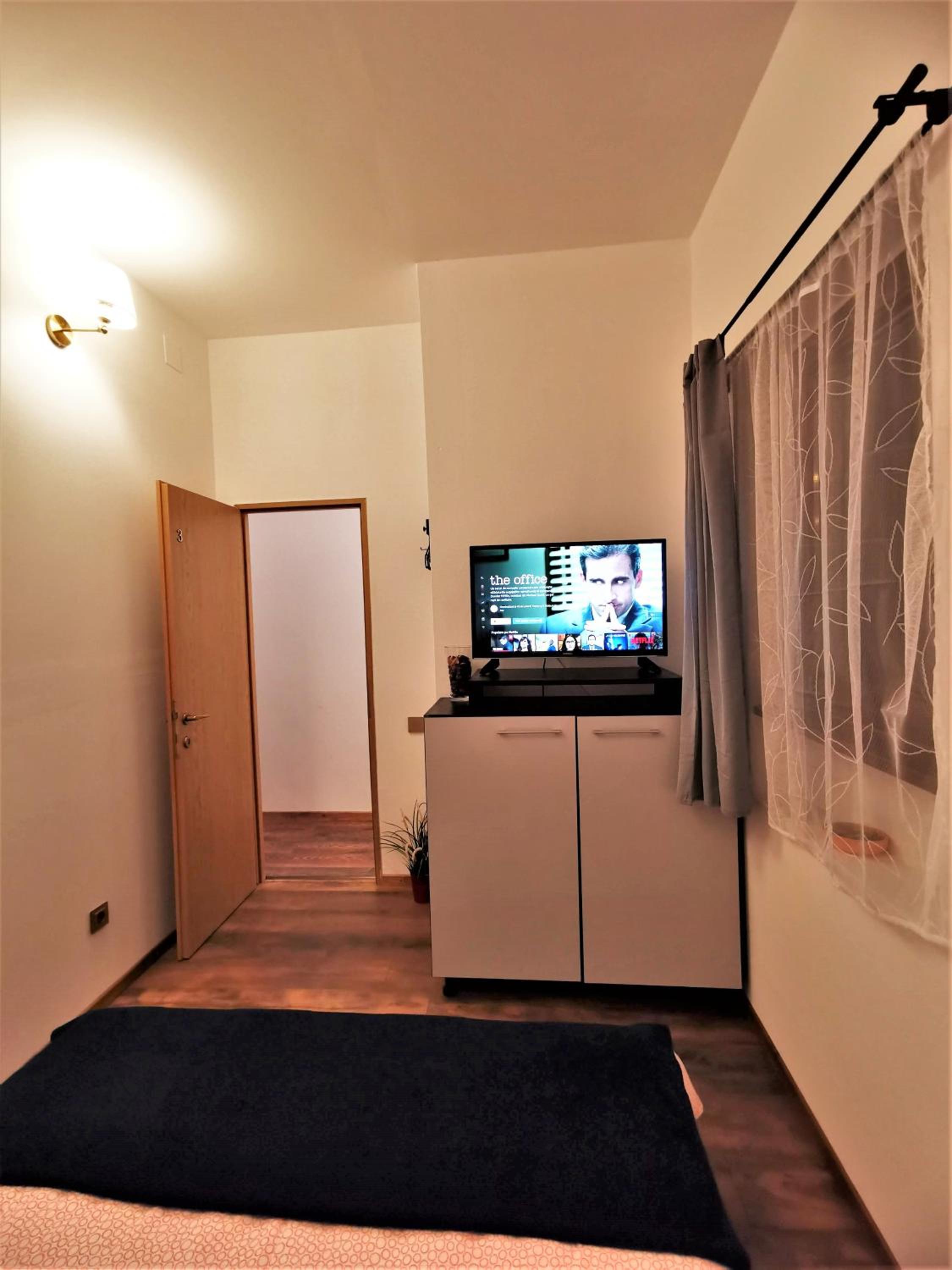 Three-Bedroom House - Photo 29