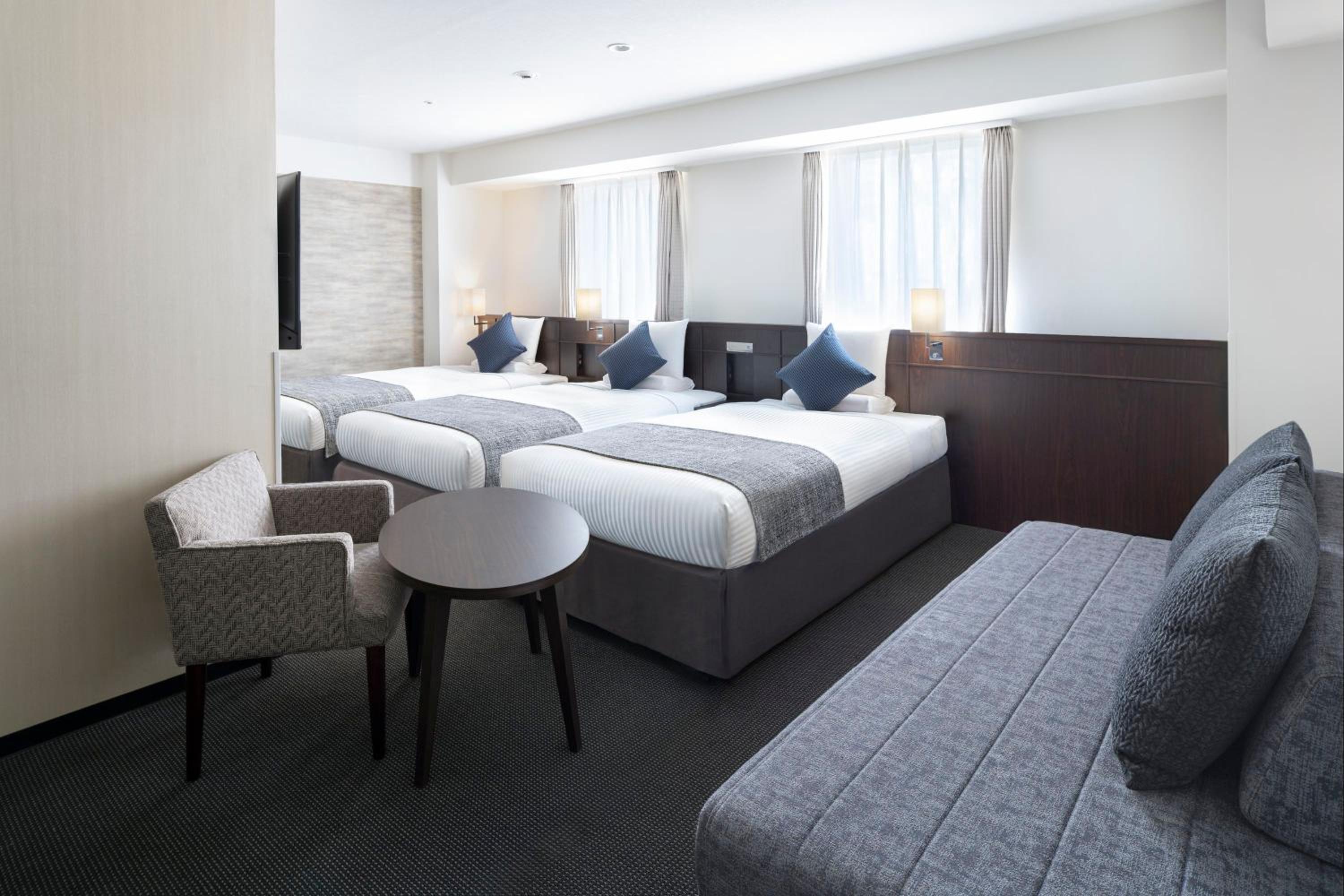 Deluxe Triple Room - Smoking photo 1