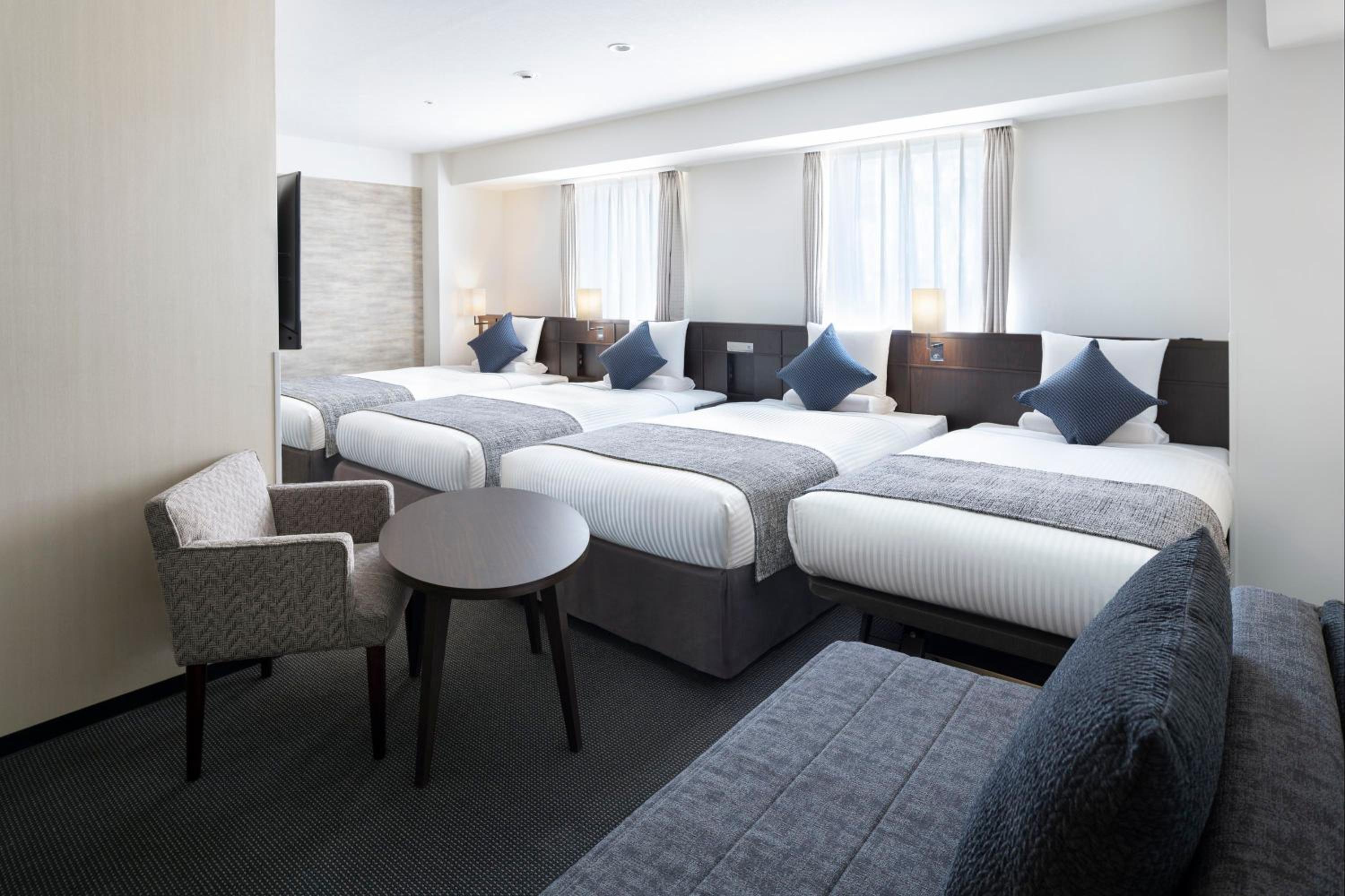 House Keeping is Optional with Additional Cost - Deluxe Quadruple Room - Non-Smoking photo 1